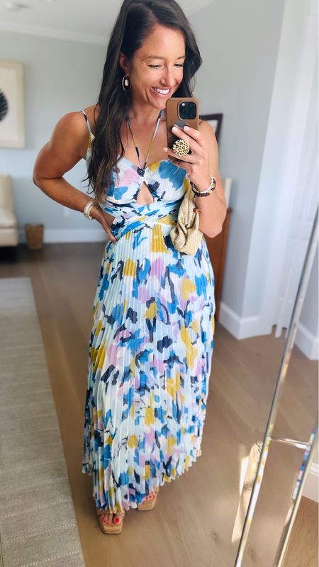 This breezy number from Revolve is a spring to summer staple! With a playful print and flowy silhouette, it's sure to turn heads wherever you go. Pair it with your favorite sandals for a look that's effortlessly chic! 💐👗 #RevolveFashion #SpringDress #FloralFrenzy #StyleInspiration

#LTKbeauty #LTKstyletip #LTKparties