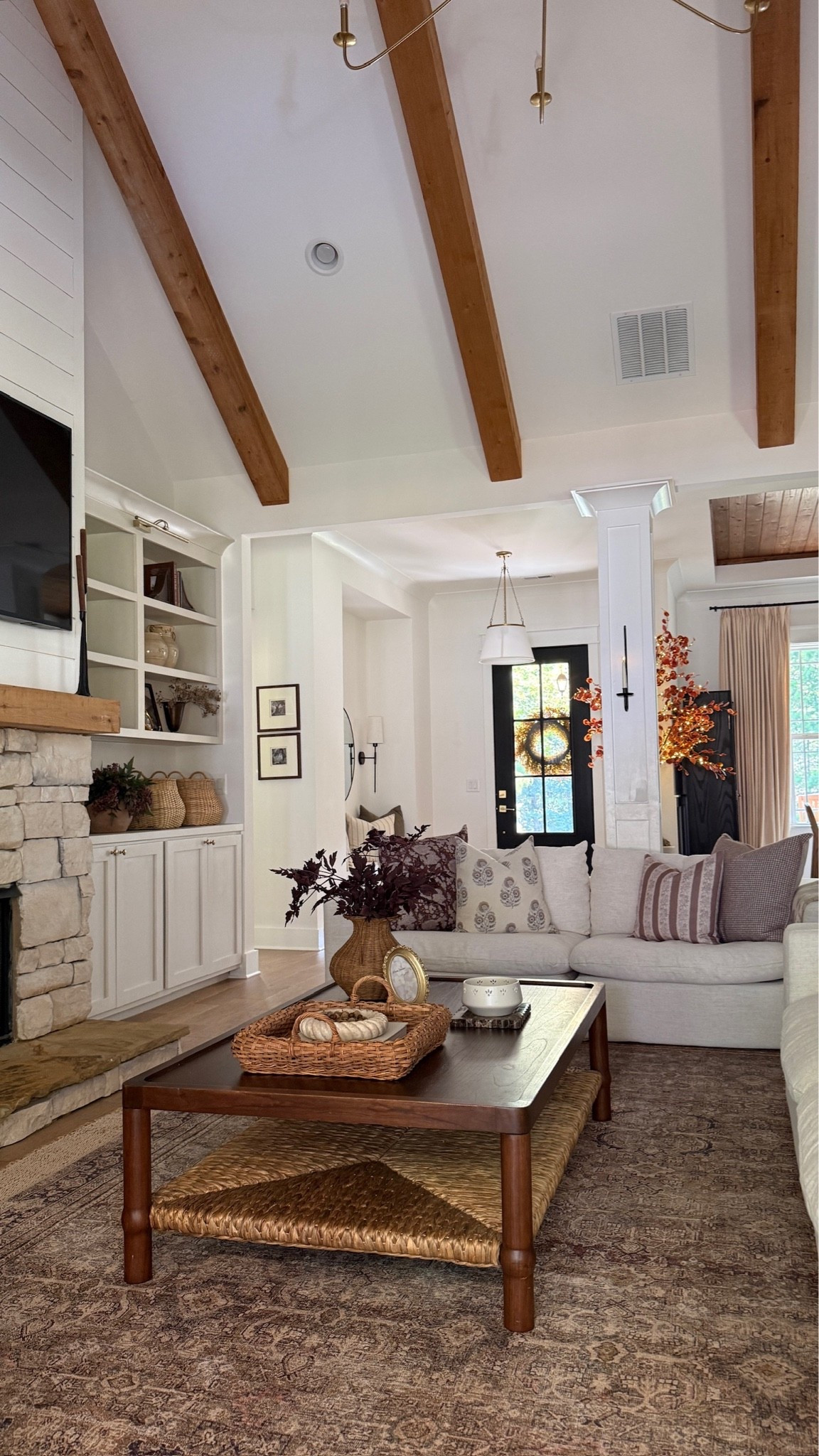 Could our great room get any cozier? 🤩🍂🤎 The pops of seasonal stems, colors, and patterns create such a pretty space for fall.

#LTKSeasonal #LTKHome