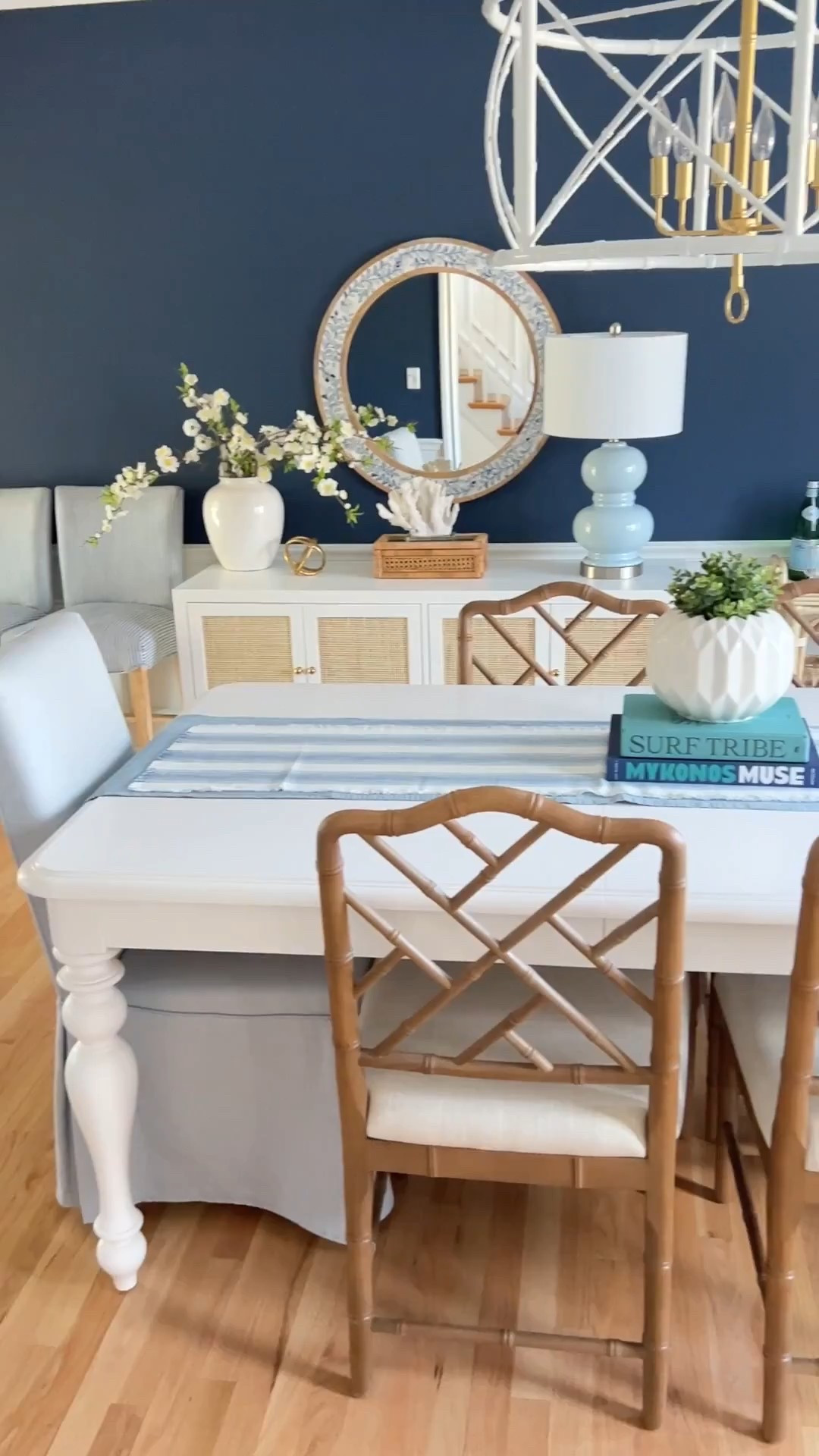 My coastal dining room features a white dining table, blue dining chairs, and blue and white accent pieces for a classic modern coastal look. I love how the crisp white furniture paired with layered blue and white decor makes this space feel bright, airy, and designer-inspired.



#LTKU #LTKHome #LTKSaleAlert