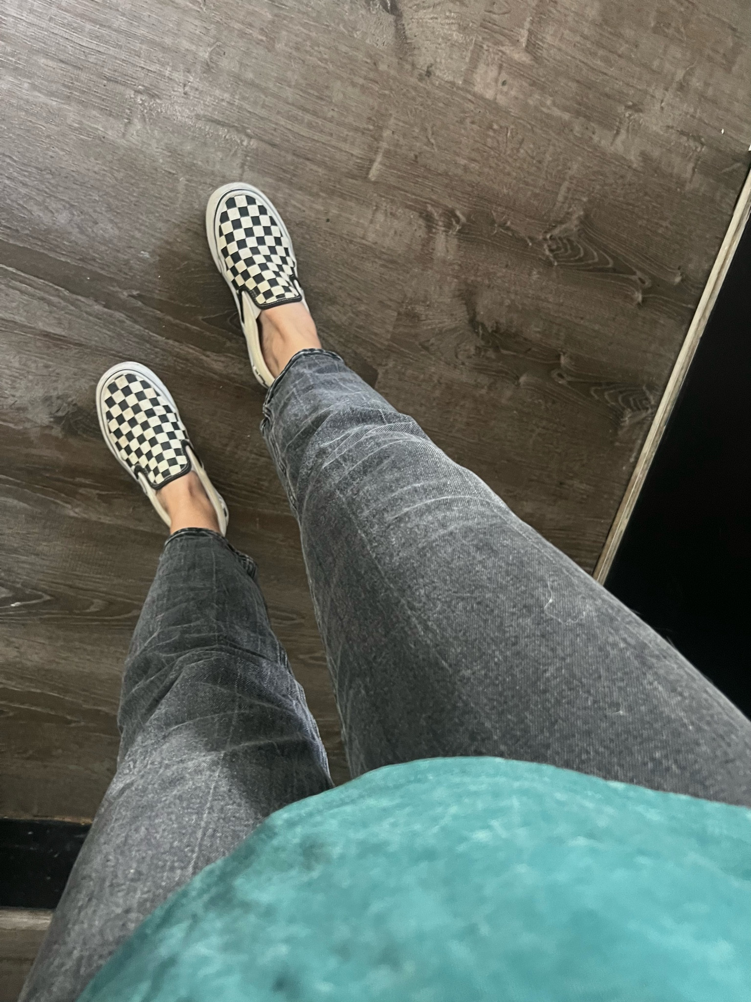 Black denim high rise jeans with vans checkerboard slip ons 
