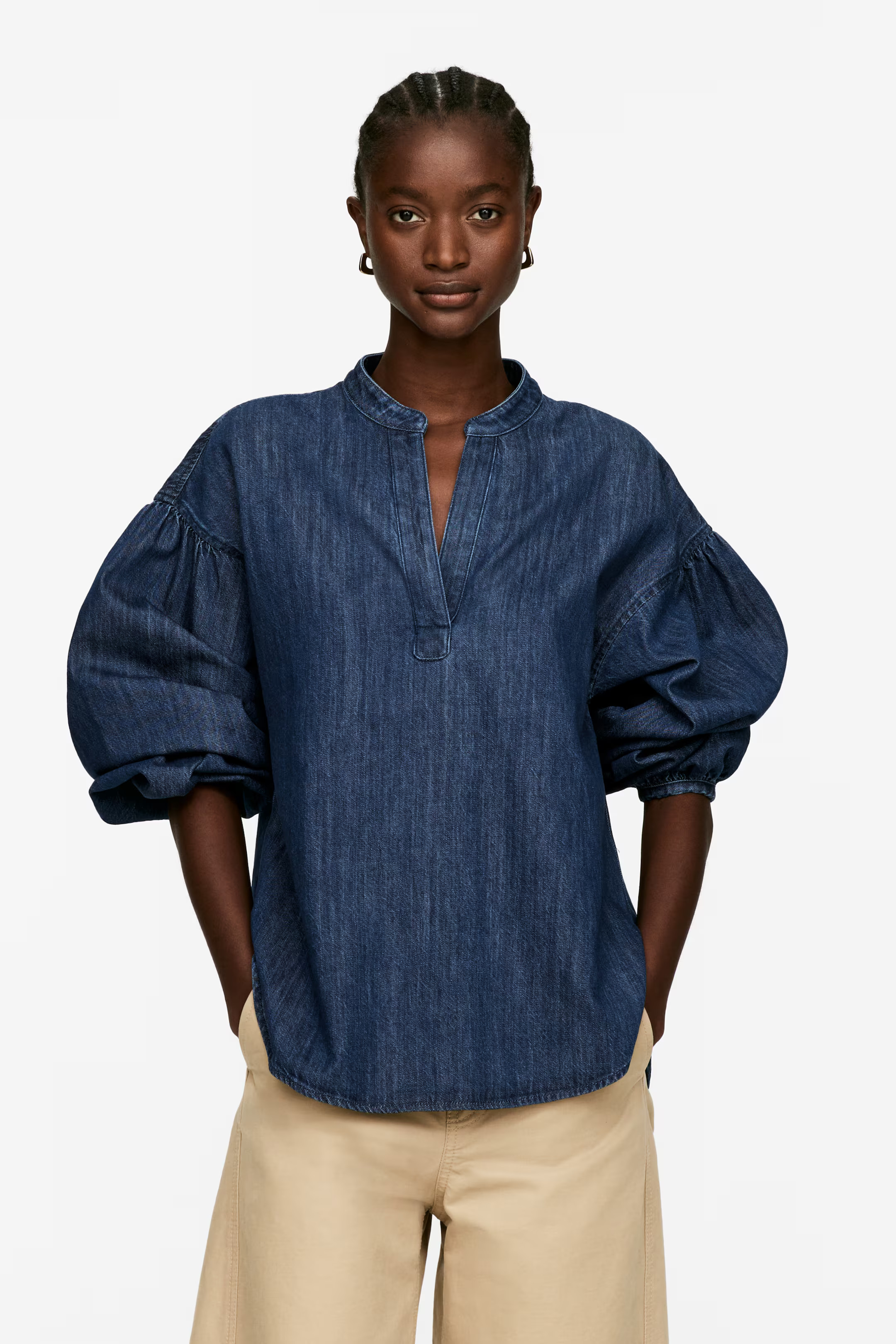 Denim blouse met volumineuze mouwen | H&M (DE, AT, CH, NL, FI)
