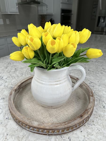 Beautiful faux tulips in a farmhouse pitcher vase combined with a round wood tray! #amazon #amazonhome #homedecor #tulips #flowers #tray #mandy’s #home


#LTKhome