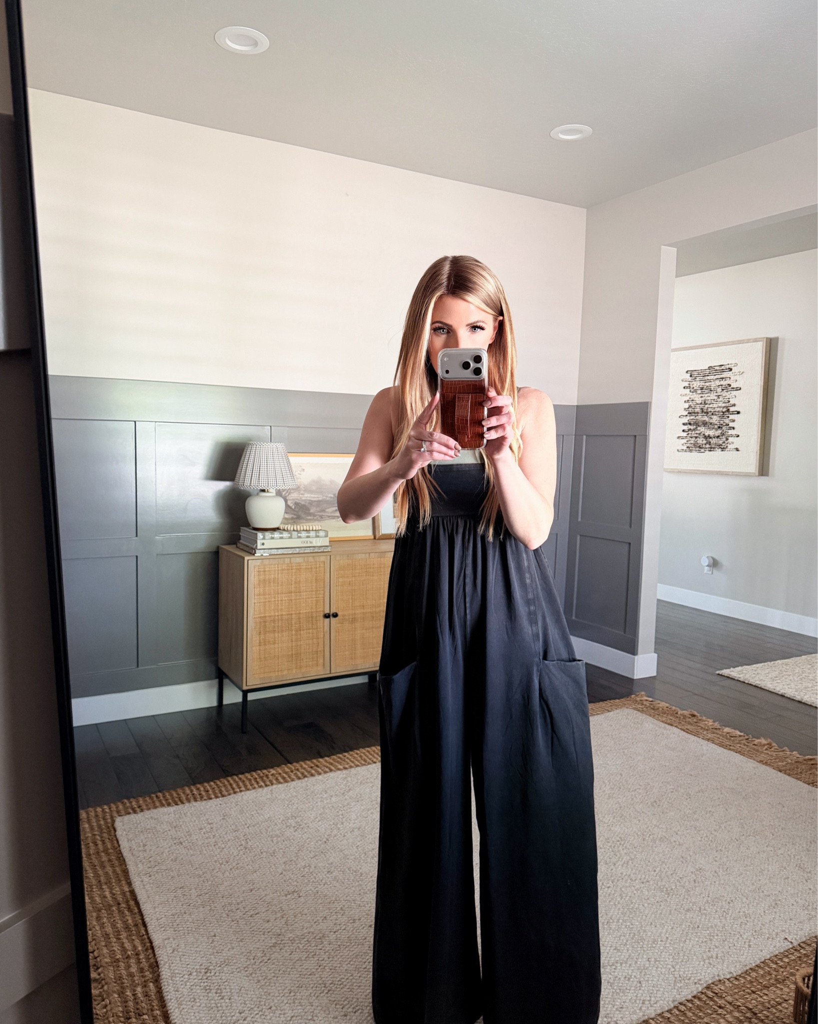 My new favorite throw-on & go. The Free People Hot Shot Strappy onesie is ridiculously comfortable; flowy wide leg, adjustable straps, & the oversized pockets are actually useful. Easy with sneakers, sandals, or layered with a jacket. I grabbed both navy & black. Wearing size S.

free people hot shot onesie - free people strappy onesie - free people movement onesie - wide leg jumpsuit casual - comfy jumpsuit outfit - athleisure jumpsuit - loose fit onesie outfit - travel outfit comfy - everyday jumpsuit outfit - throw on and go outfit - oversized pocket jumpsuit - black jumpsuit casual - navy jumpsuit outfit - casual spring outfit - summer comfy outfit - mom style outfit - effortless outfit idea - comfortable everyday outfit - loungewear jumpsuit - relaxed fit jumpsuit