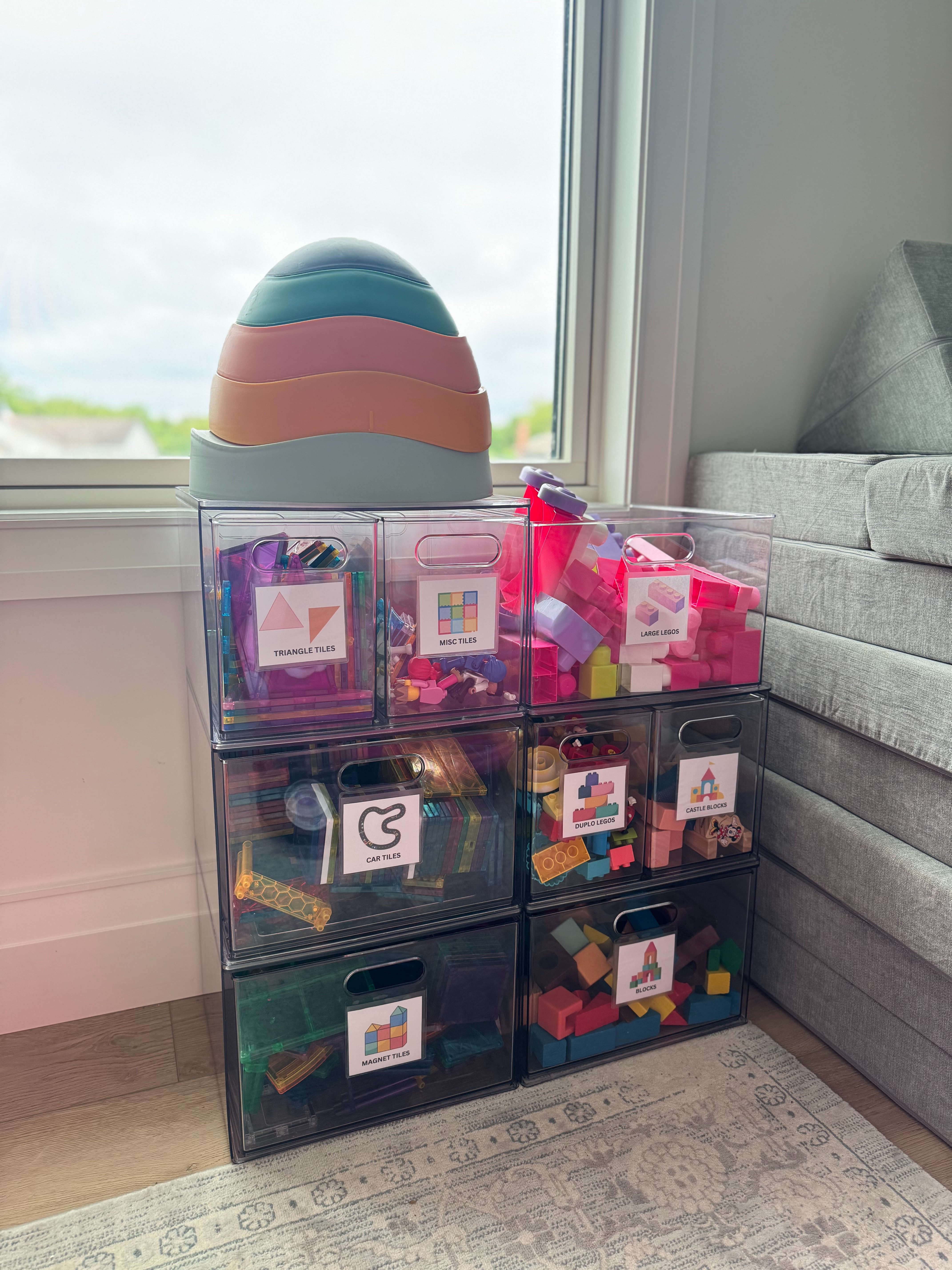  

This little toy storage corner has been working so well for all the blocks and tile sets.

I used these clear drawers with adhesive label holders so the kids can easily find what they want—and actually help put things away 🙌 The rainbow stacking arches on top are one of our most-played-with toys too!

block storage ideas, toy bin labels, playroom organization, amazon toy storage, magnetic tile storage, duplo organization, toddler toy systems, toy shelf setup, functional playroom design

 

#LTKHome #LTKFamily #LTKKids