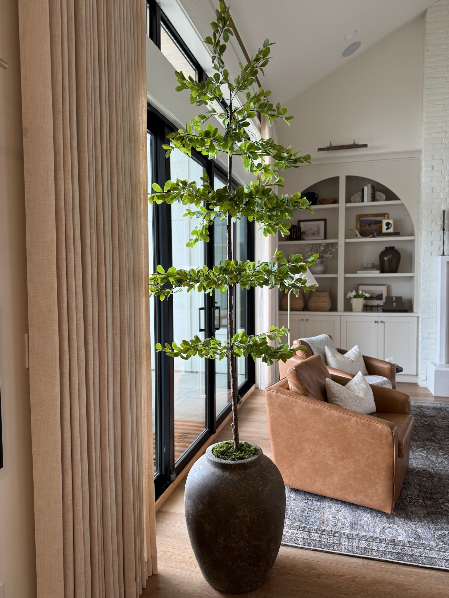 Adding a faux tree to your home instantly adds color, provides height, and elevates any space. This particular one you guys sold out, but the other option I have linked I ordered and it’s so good!! I might even like it better! 

#LTKStyleTip #LTKHome