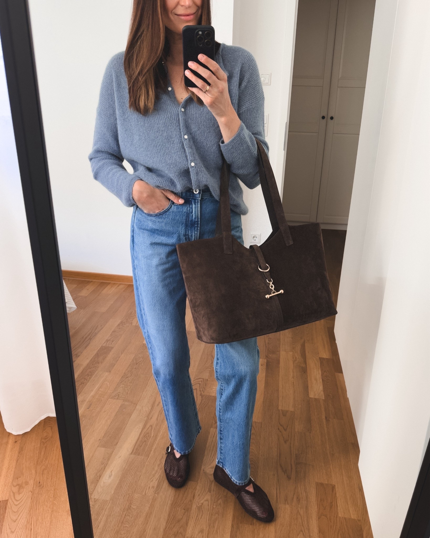 Chocolate brown and vintage blue:
- Strathberry Bag linked below
- Cardi - wearing medium (oversized fit)
- Uniqlo Jeans - I’m usually size 27 in brands like Levi’s, but here I’m wearing size 25
- shoes - brand Badura (linked  similar options)