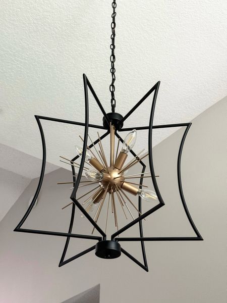 Black and gold pendant chandelier, home decor 

#LTKhome #LTKfamily #LTKstyletip