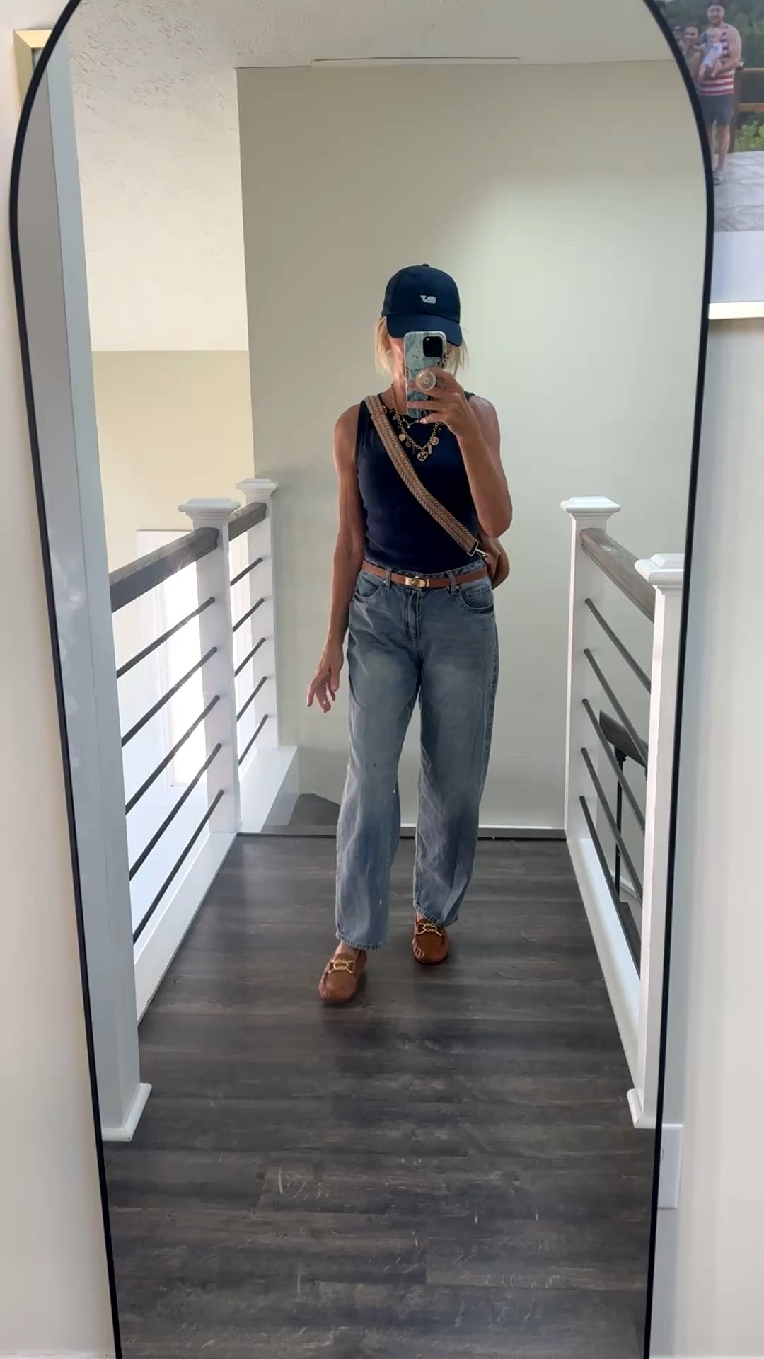 Baggy jeans, fitted tank, loafers, cross body bag, adjustable belt, charm necklace, @Vineyard Vines hat  

#LTKOver40 #LTKootd #LTKPetite