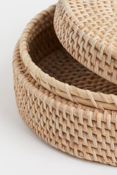 Large, round rattan pot suitable for storing small items that also creates an attractive interior... | H&M (US + CA)