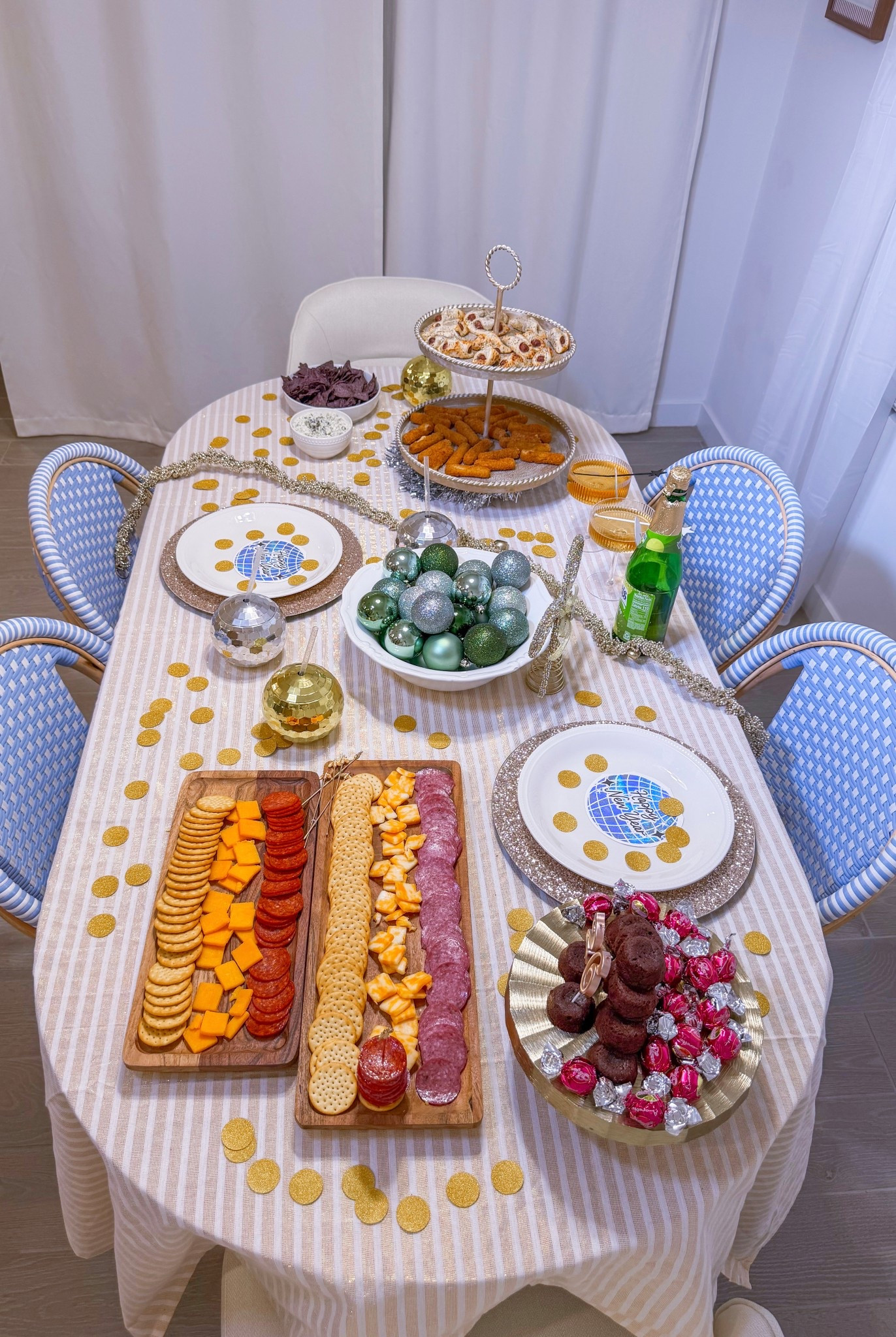 Charcuterie, sparkling cider, mini desserts, and a sprinkle of NYE gold 💛 I always have so much fun styling our table and trying something new each year. Creating these is my favorite tradition 🌌🍾🥐🧀

#LTKHome #LTKfoodie #LTKSeasonal