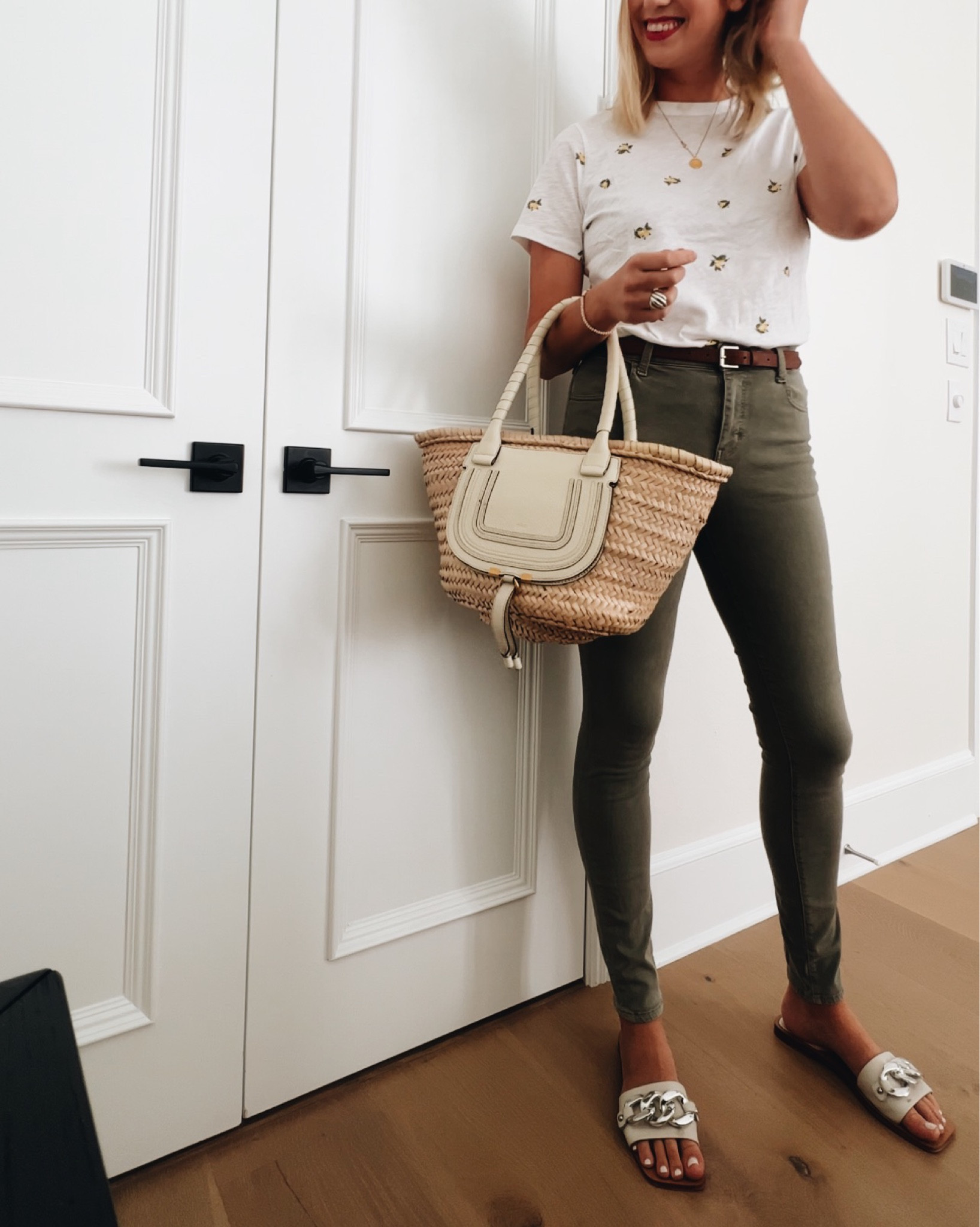 Tall Green Skinny Pants / Old Navy Lemon Tee / Chloe raffia tote / white buckle slides / skinny jeans / classy style / smart casual / tall style / tall pants / teacher outfit / fall style / mom style / designer style 

#LTKitbag #LTKSeasonal #LTKBacktoSchool