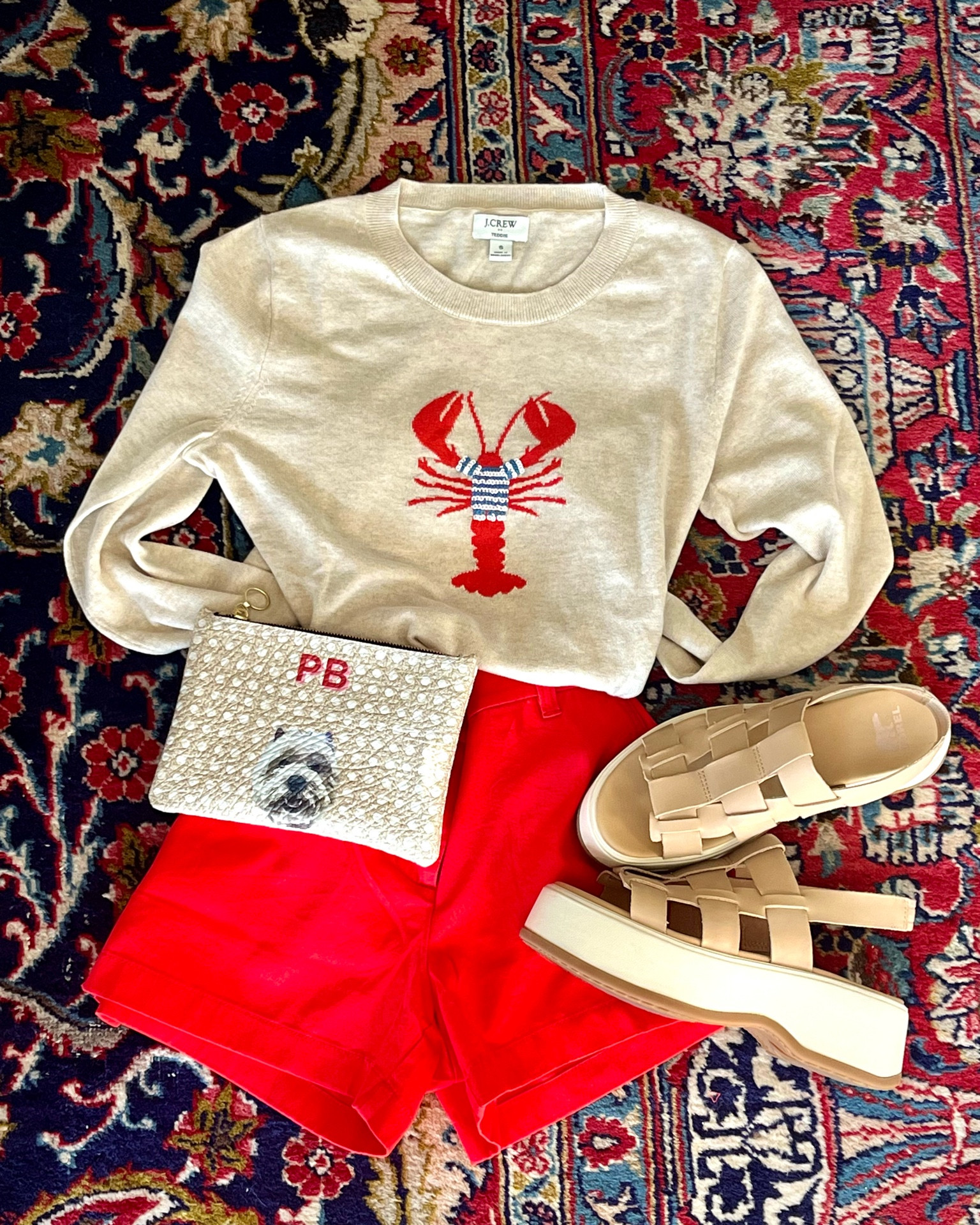 My summer look! 🦞 Slightly obsessed with all things lobster these days .. Couldn’t resist this Jcrew Factory Lobster Teddie sweater and lobster red shorts. They’re having a huge sale right now - 50–70% off everything so don’t miss out. I will link everything else I purchased plus some other gorgeous pieces I’m eyeing before the weekend sale ends. Completed the look with these Sorel platform sandals I’ve been wearing on repeat. 

#LTKFindsUnder50 #LTKSeasonal #LTKSummerSales