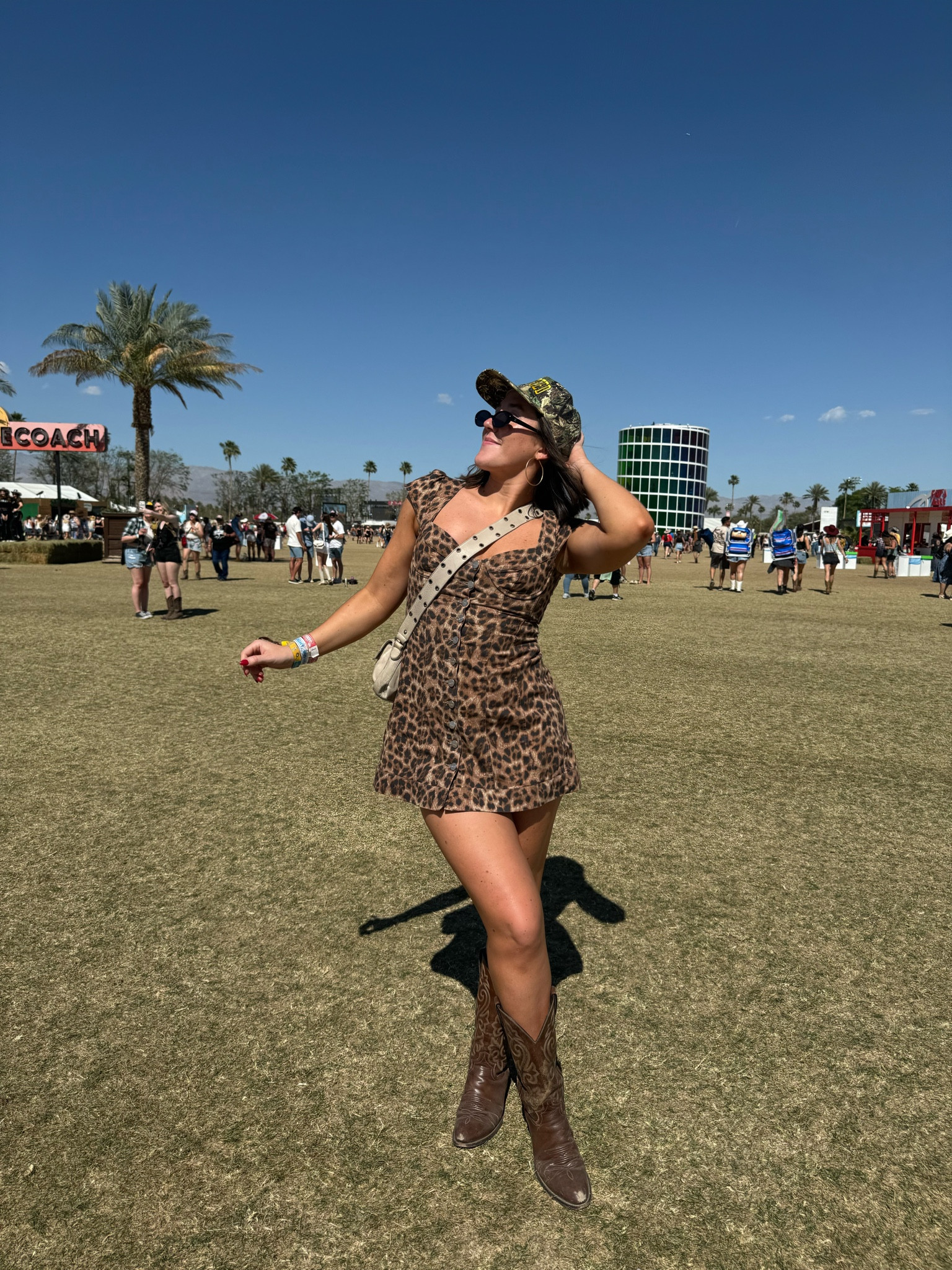 Stagecoach Day 3 - cheetah dress is miaou but sold out, hat is Zach Bryan Tour Merch