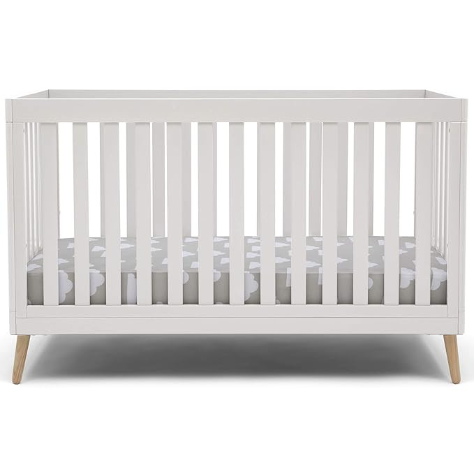 Delta Children Essex 4-in-1 Convertible Baby Crib, Bianca White with Natural Legs | Amazon (US)