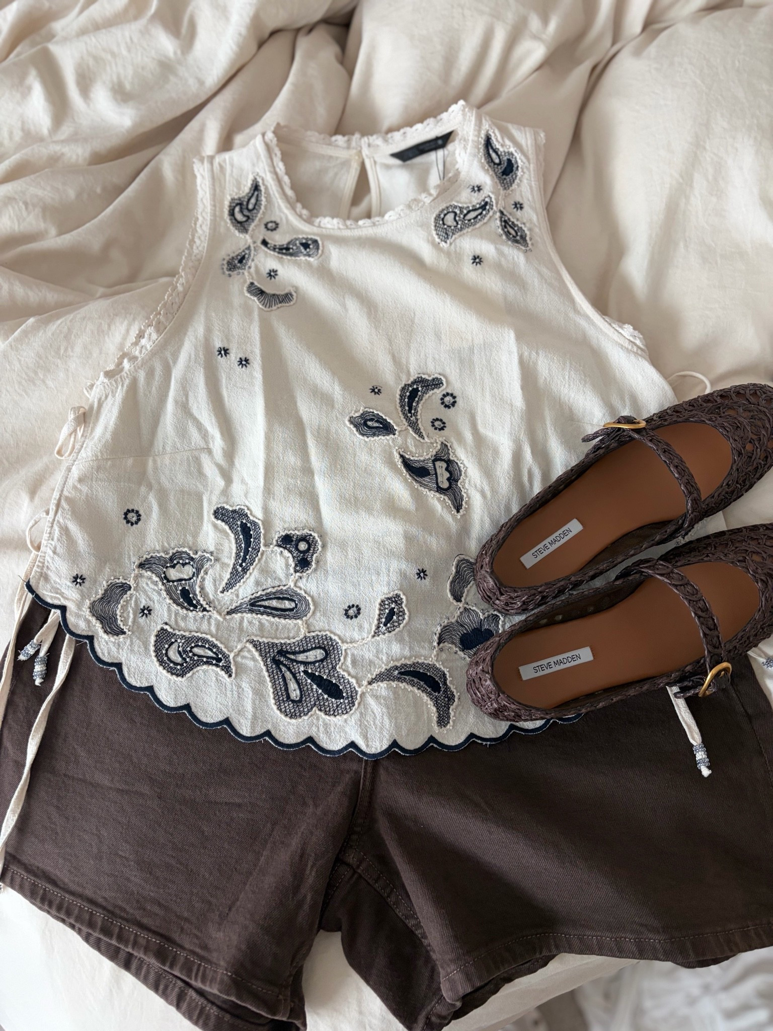 These Zara mom shorts fit SO good on a curvy body without that annoying waist gap situation. Fitted in the waist, room through the hips and thighs, and the perfect length where they still feel cute and flattering without being too short for real life. Paired them with this embroidered Zara top with the prettiest bead details and side ties plus these woven brown Mary Janes that look way more expensive than they were. Everything linked below!

#zaraoutfit #curvyfashion #momstyle #summeroutfit #maryjaneshoes #ltkstyle #casualchic #everydayoutfit

#LTKootd #LTKgrwm #LTKSeasonal