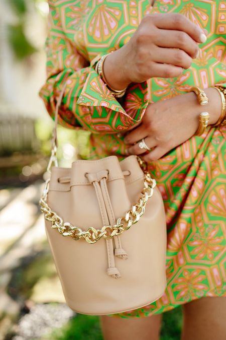 Is this palm deco print not everything for spring in Palm beach?! I’m in love! Wearing sz small here —
Close up of my Brooklyn bucket bag in the cappuccino color! Take 20% OFF my bag with code: HAUTE20

#giginewyork #giftidea #giftsforher #bucketbag #springoutfit #vacationoutfits #tanhandbag #neutralhandbag
#springhandbag 


#LTKsalealert #LTKstyletip #LTKitbag
