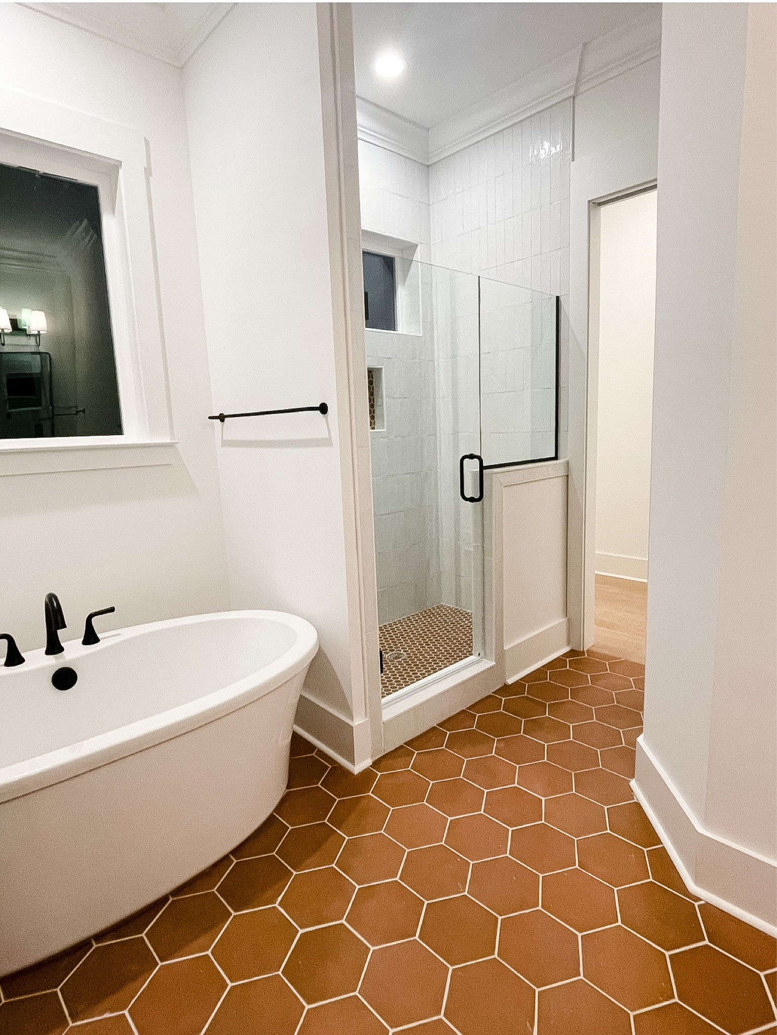 Our Master Bathroom design. Double Vanity, walk-in shower, double vanity, tile, shower wall tile, shower floor tile, mirrors, lighting, vanity lighting, towel rods, bathroom hardware, Terra cotta, bathroom floor tile, bathroom wall tile, tub, bathroom mirrors

#LTKbeauty #LTKhome #LTKstyletip