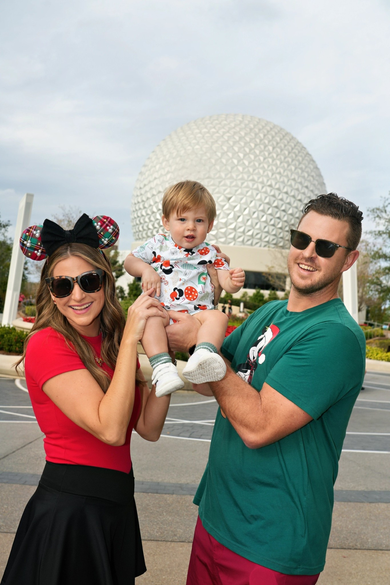 Family ootds for Christmas at Disney! I’m in a small top, medium skirt, sneakers, sunglasses from Amazon - ears and Storms outfit are Etsy! What to wear to Walt Disney world at Christmas 

#LTKootd #LTKTravel #LTKHoliday