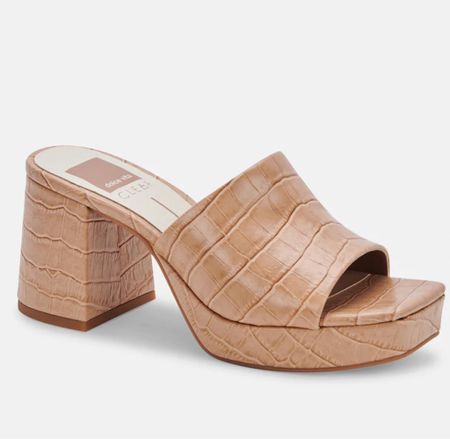 DETAILS
Embossed. Understated. In-demand. MARSHA is the modern mule of our dreams, in a palette of luxe neutrals that are perfect for spring. Sleek yet subtly chunky, a block heel and slight platform lends so much character to this versatile style.

#LTKshoecrush #LTKunder100 #LTKsalealert