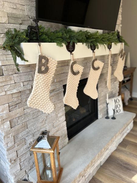 Christmas mantle with the prettiest garland! 

#LTKHoliday