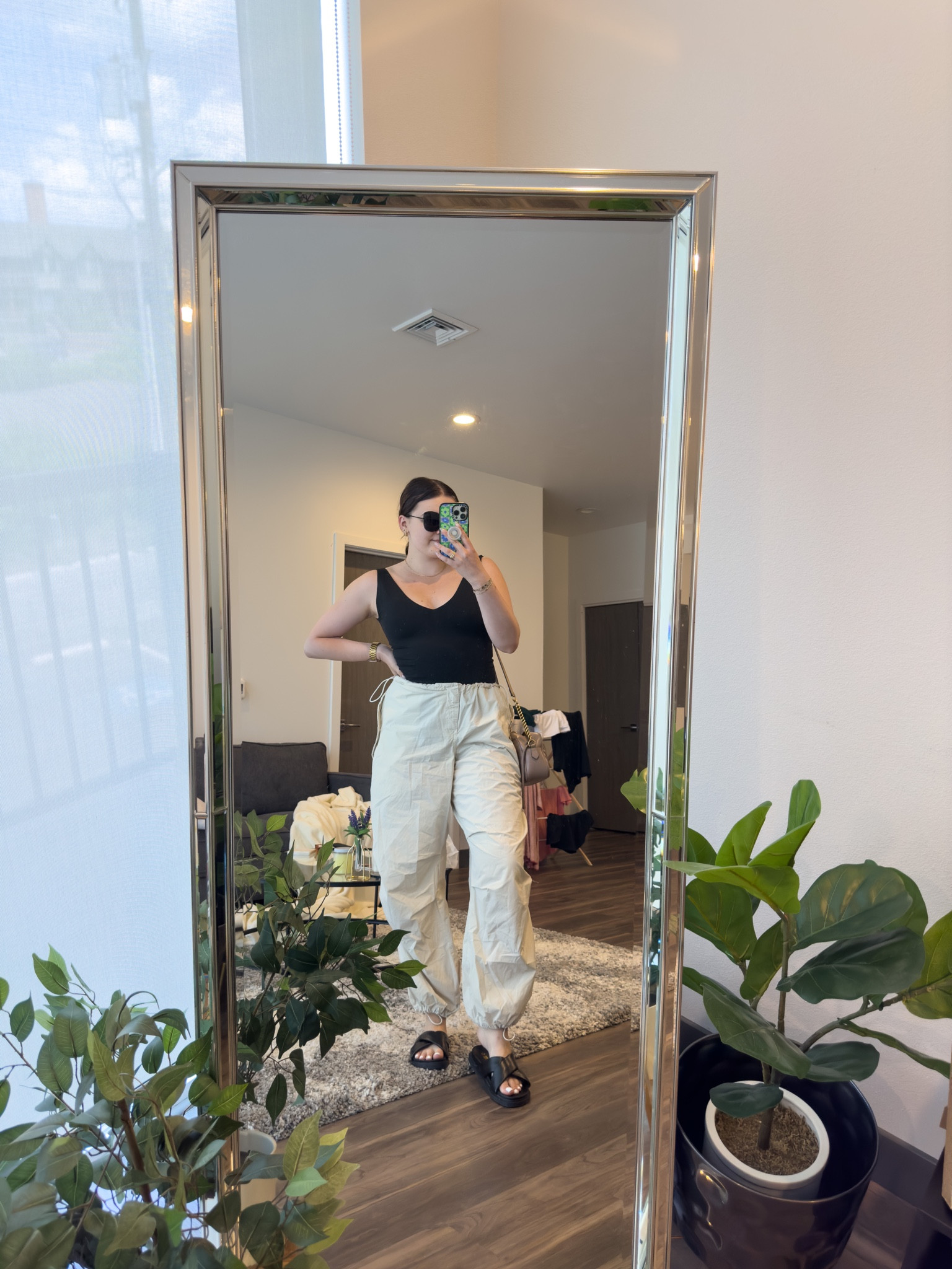 Ultra casual spring outfit idea. Featuring my new favorite parachute pants. 

I’m wearing a M bodysuit, L pants and size 9 sandals 

#LTKunder100 #LTKstyletip #LTKSeasonal