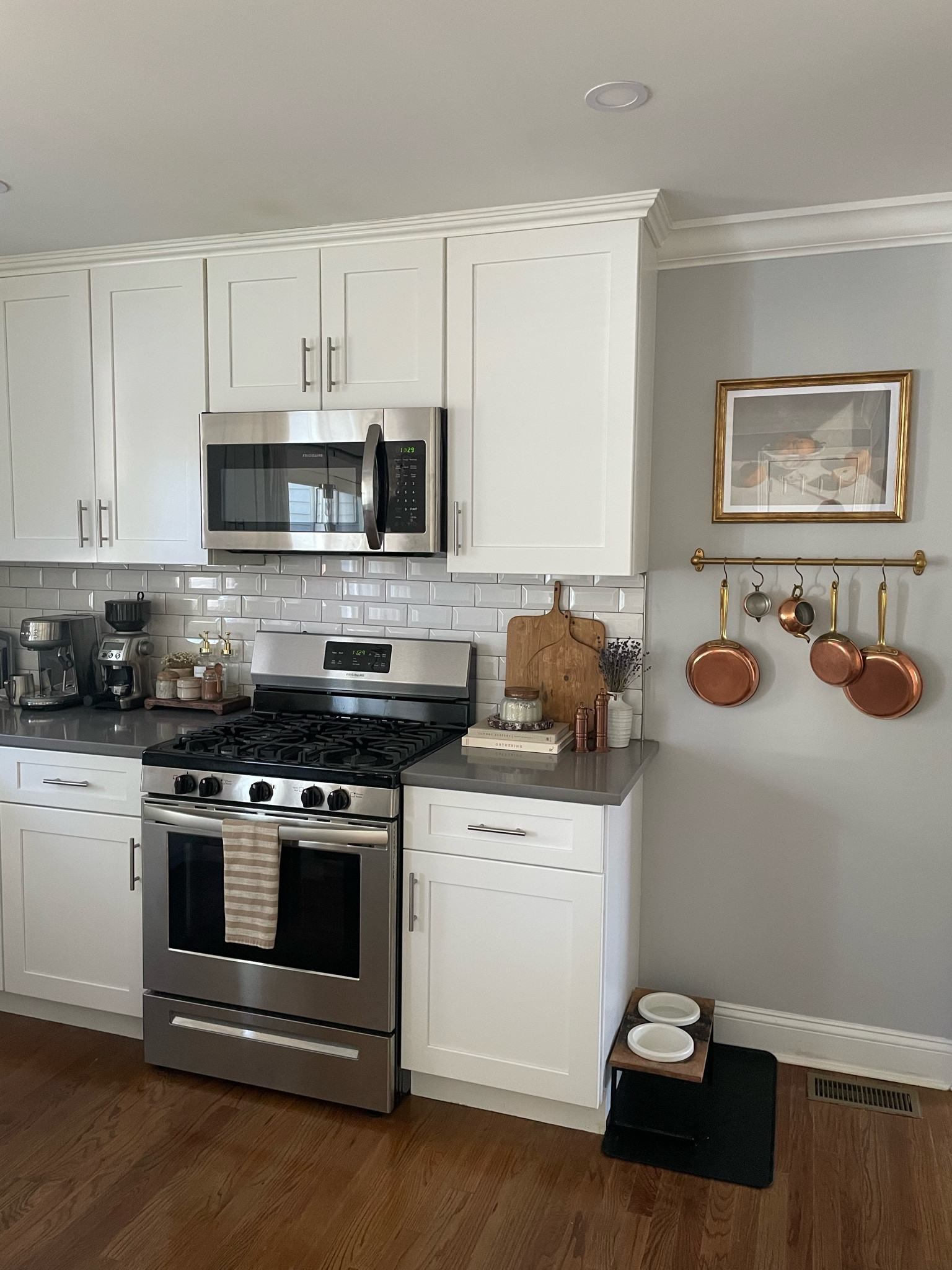 Kitchen styling, kitchen decor, transitional style, copper pot rack, coffee bar, antique cutting boards

#LTKHome #LTKFindsUnder50 #LTKFindsUnder100