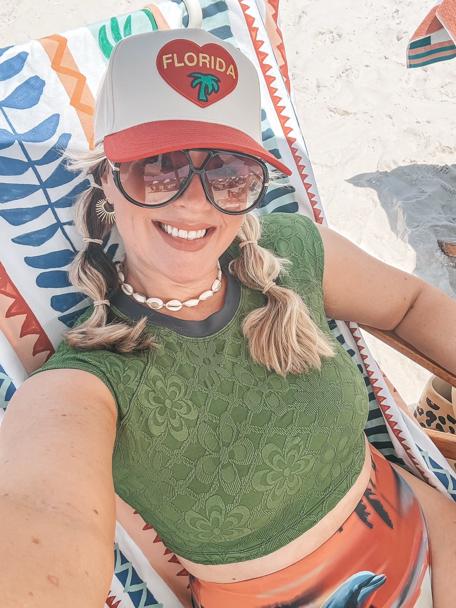 I’m obsessed with this swim top! I’ve had 3 years now and love it! Also this Florida hat is the cutest! I wear a medium in this top but size up in the black it’s more tight.

#LTKOver40