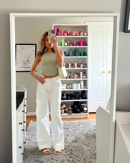 Easy casual spring outfit idea. These straight leg white jeans are amazing from American eagle. Basic baby tank is $15! 💕