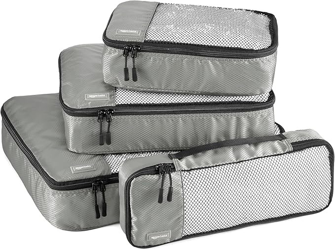 Amazon Basics Lightweight Packing Cubes for Travel, 4 Piece Set With Double Zipper Pulls and Mesh... | Amazon (US)