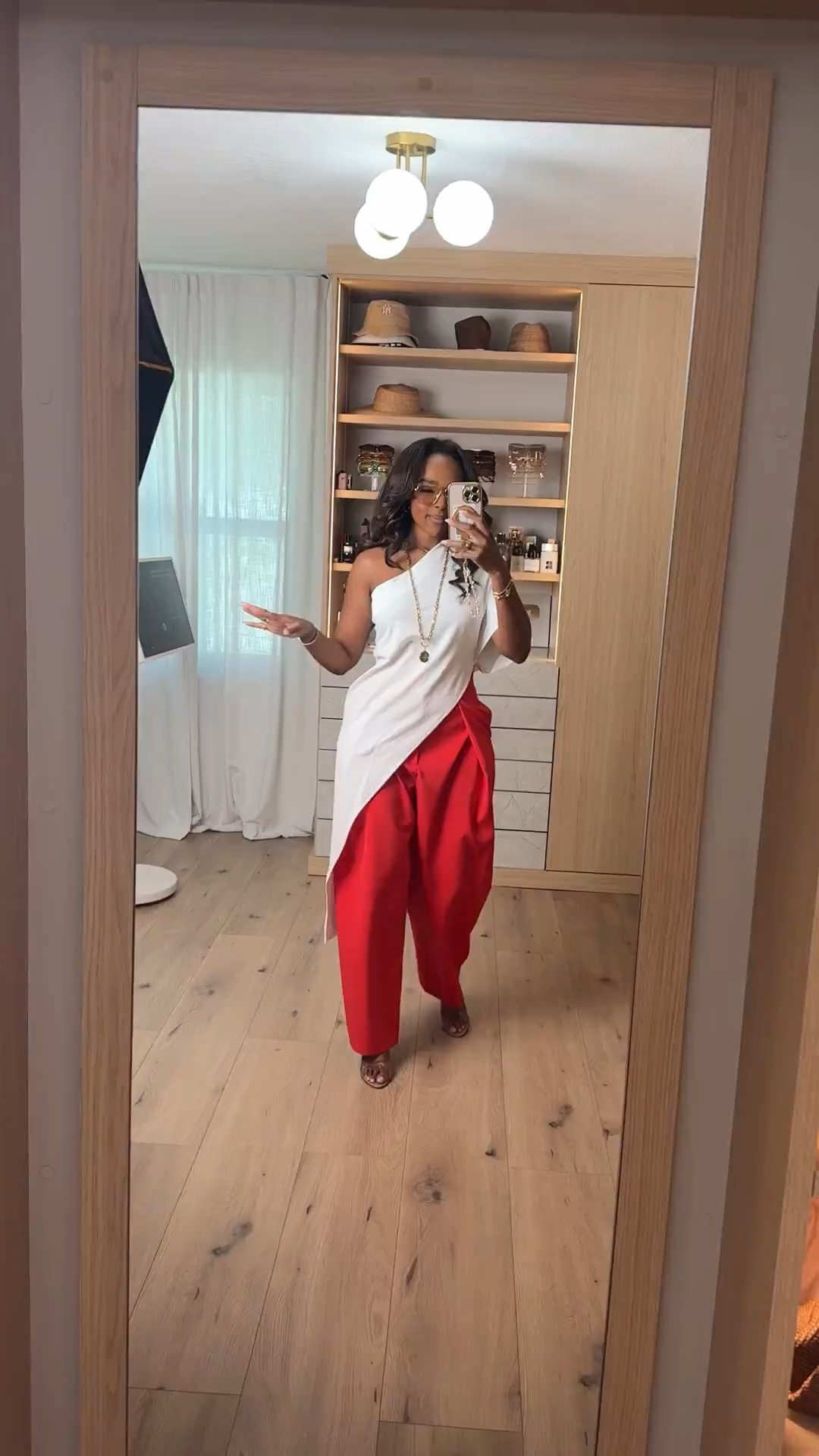 I know bold colors can feel intimidating, but pairing them with a simple white top makes the whole look feel so chic and effortless. It's the perfect outfit when you want to stand out without trying too hard.

Fit Details:
• Asymmetrical white tunic top
• High-waisted red statement pants
• Neutral heels
• Long gold layered necklace
• Minimal accessories

Where to wear:
• Brunch with the girls
• Vacation dinners
• Art shows
• Date nights
• Birthday celebrations
• Any day you want to make a statement

Everything is linked below!

xx, Kira | IG: KirasFashionFinds

Measurements: 5'3" | Wearing Size XS

@Zara

#LTKootd #LTKPetite #LTKgrwm