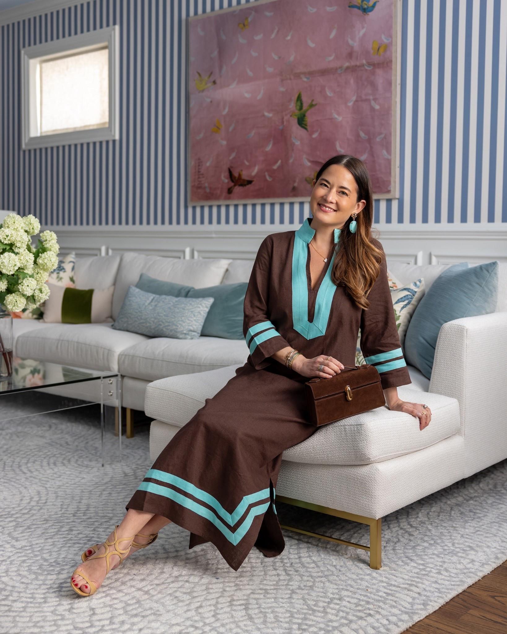 Shop this chic brown and blue tunic style caftan, brown pochette, and nude sandals. The dress is from the recently launched Sail to Sable x Meeghan Mullin capsule collectionn

#LTKItBag #LTKSeasonal #LTKStyleTip