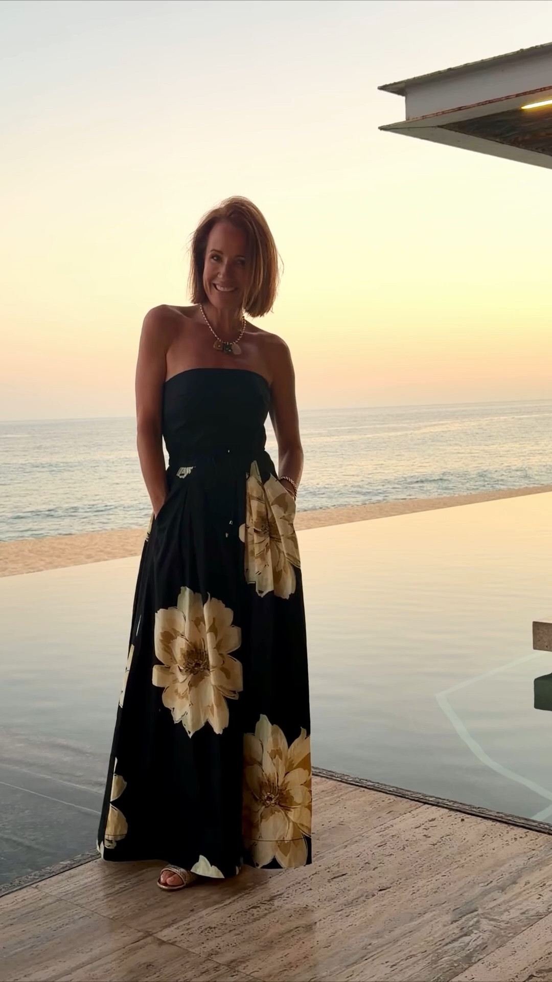 Effortless vacation style in this strapless Anthropologie maxi dress 🌴
The black floral print + flowy silhouette makes it the perfect beach dinner dress, resort outfit, or summer vacation look. Lightweight, flattering, and easy to throw on after a pool or beach day—this is one of those pieces that feels elevated but still super comfortable.

Perfect for:
• beach dinners
• Cabo / tropical vacations
• summer date nights
• resort wear outfits
• strapless maxi dress styling

Paired it with simple jewelry and let the dress do all the work ✨

#LTKootd #LTKPetite #LTKOver40