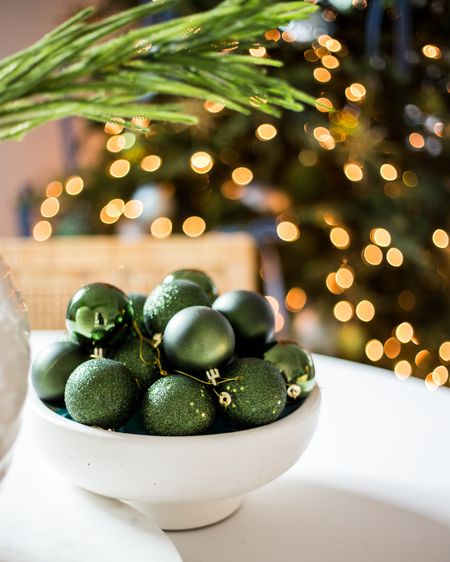 One of my favorite simple holiday decor ideas is to fill a bowl with leftover ornaments! It’s so easy and adds a perfect festive touch as a centerpiece on a dining room table or console table! See our full Christmas home tour here: https://lifeonvirginiastreet.com/2022-christmas-home-tour/.
.
#ltkhome #ltkholiday #ltkunder50 #ltkunder100 #ltkstyletip #ltkgiftguide #ltkseasonal #ltksalealert

#LTKhome #LTKunder50 #LTKHoliday
