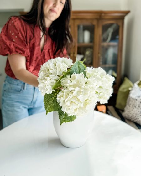 These faux hydrangeas are my favorite to add in for Spring! Add to your favorite vase for a seasonal refresh ✨

Faux florals, faux stems, seasonal blooms, hydrangeas, tulip dining chair, dining chair, acrylic dining table, dining table, sunroom, breakfast nook, kitchen,dining room, women’s fashion, summer fashion, spring fashion, puff sleeve top #amazon #amazonhome #amazonfashion



#LTKmidsize #LTKfindsunder50 #LTKhome