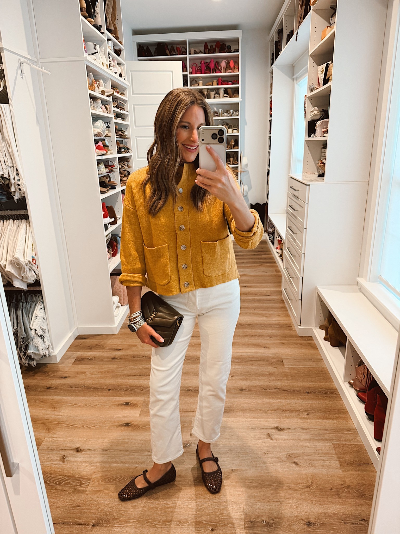 In a small cardigan, size 27 jeans, flats and accessories - fits tts.

#LTKootd #LTKgrwm #LTKSeasonal