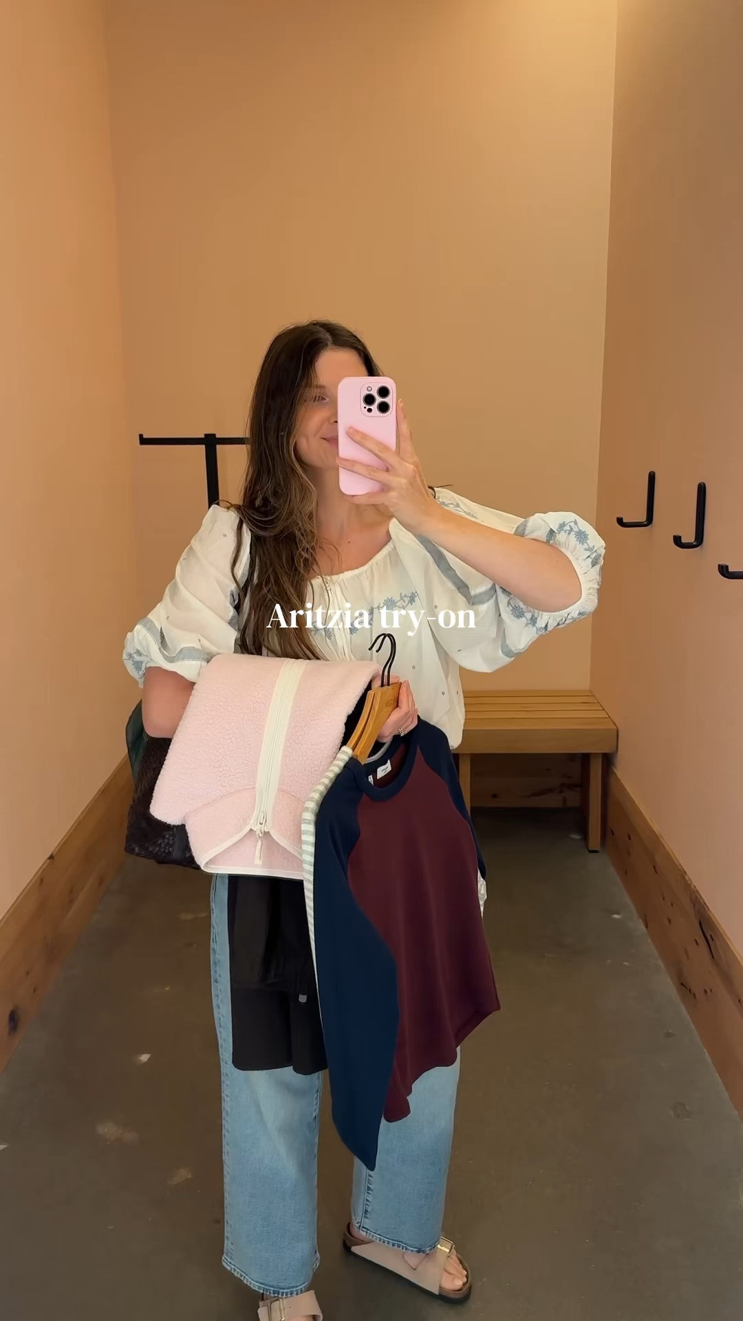 wearing a small in pink fleece and medium in everything else! Fleece and burgundy/navy top came home with me! they didn’t have sweaters in store yet!