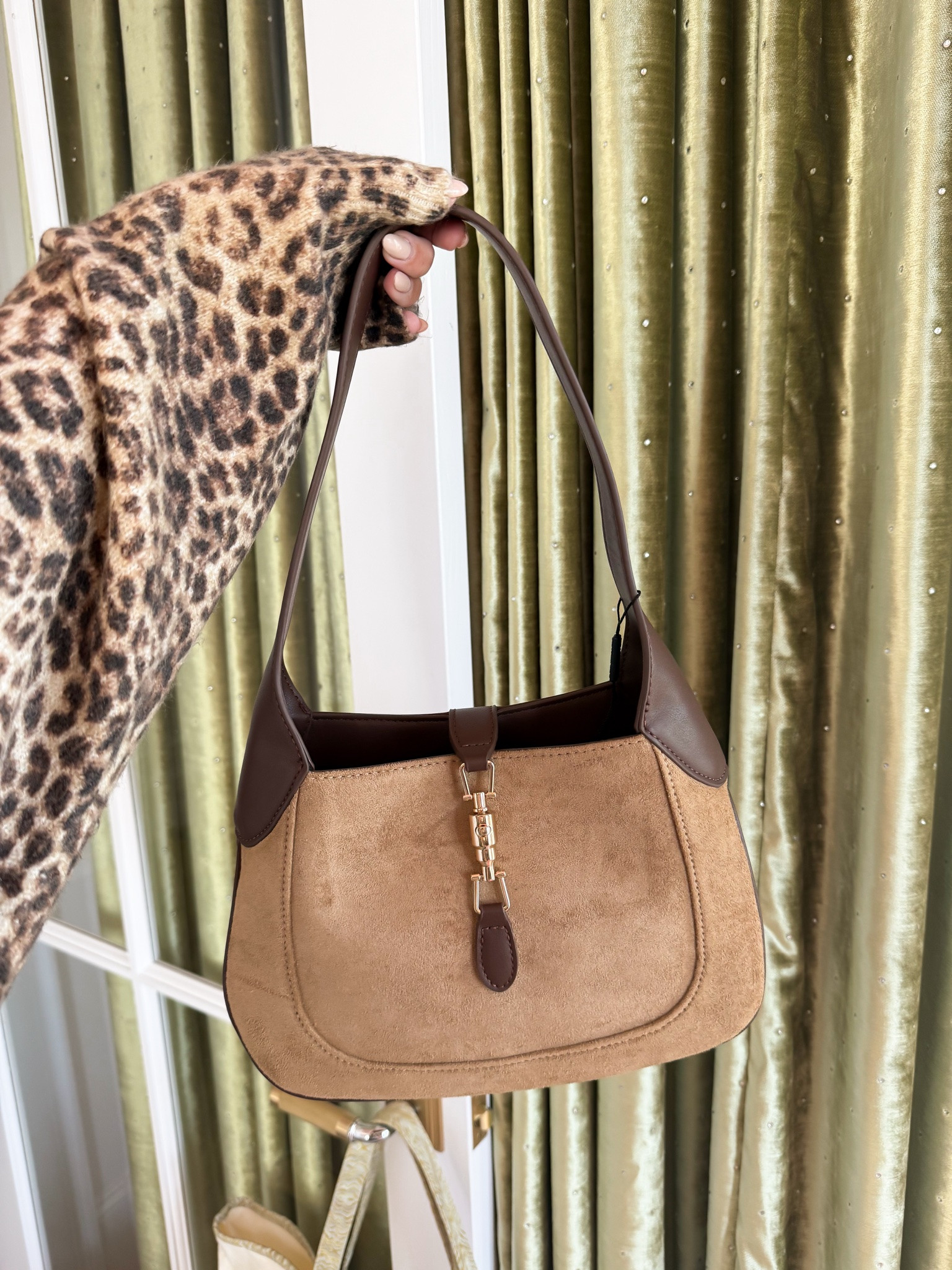 This luxe for less bag is STUNNING!

#LTKgrwm #LTKootd #LTKdayinmylife