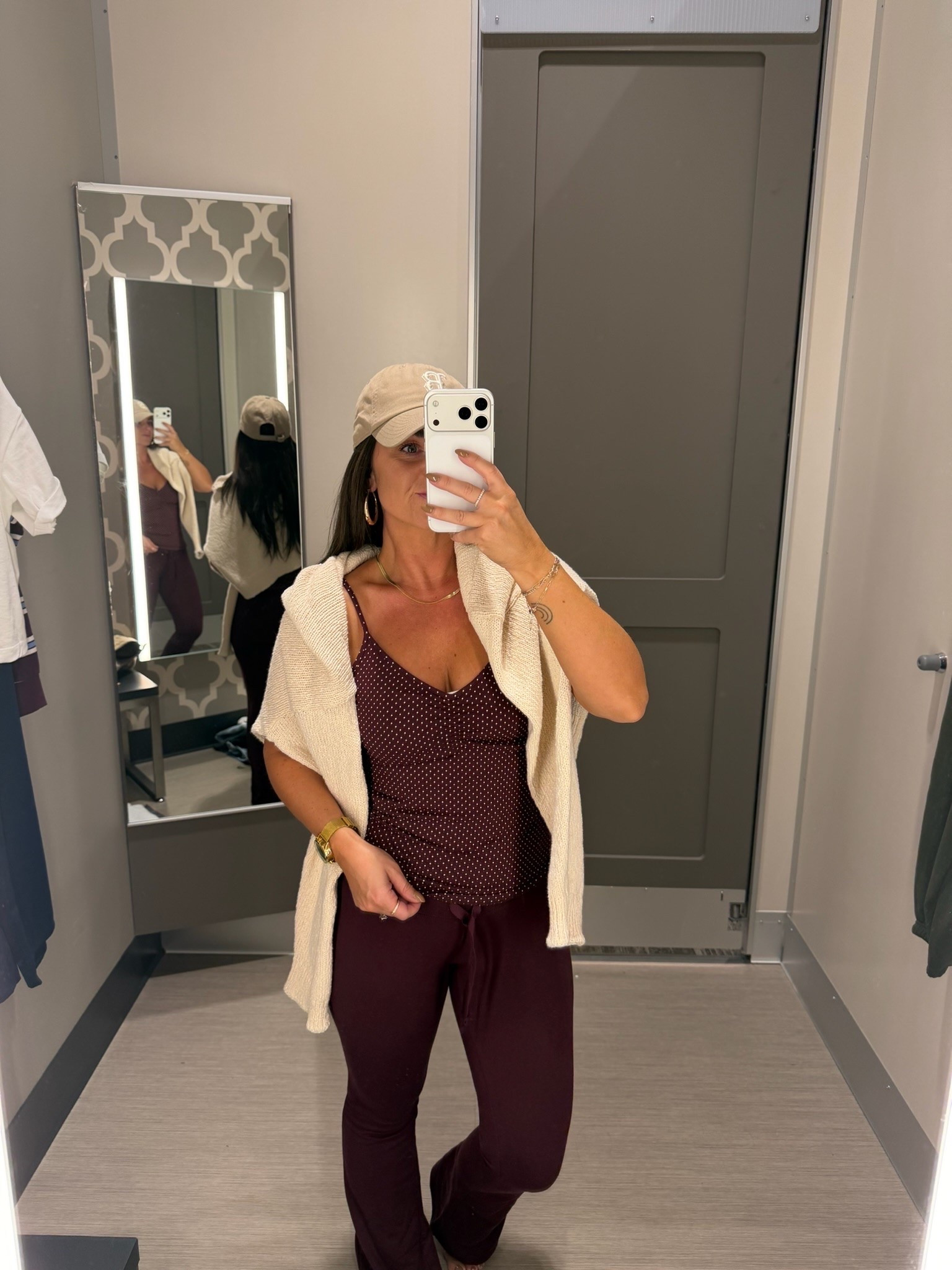 Burgundy polka dot tank paired with a sweater over the shoulders is the best transition to fall outfit 🤎

#LTKSeasonal #LTKootd #LTKgrwm