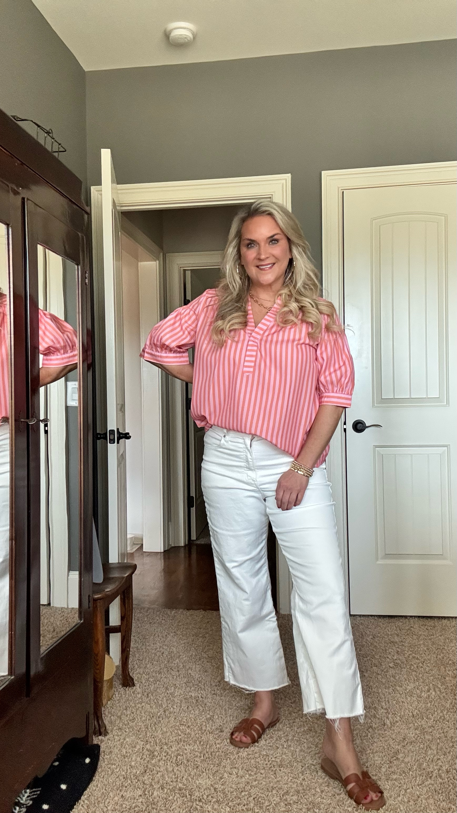 The perfect Spring cute & comfy look! 

This top is pure perfection! The puff sleeves, the stripes, literally everything! 

Paired with my favorite white jeans, and cute sandals! 

#LTKOver40 #LTKWatchNow #LTKMidsize