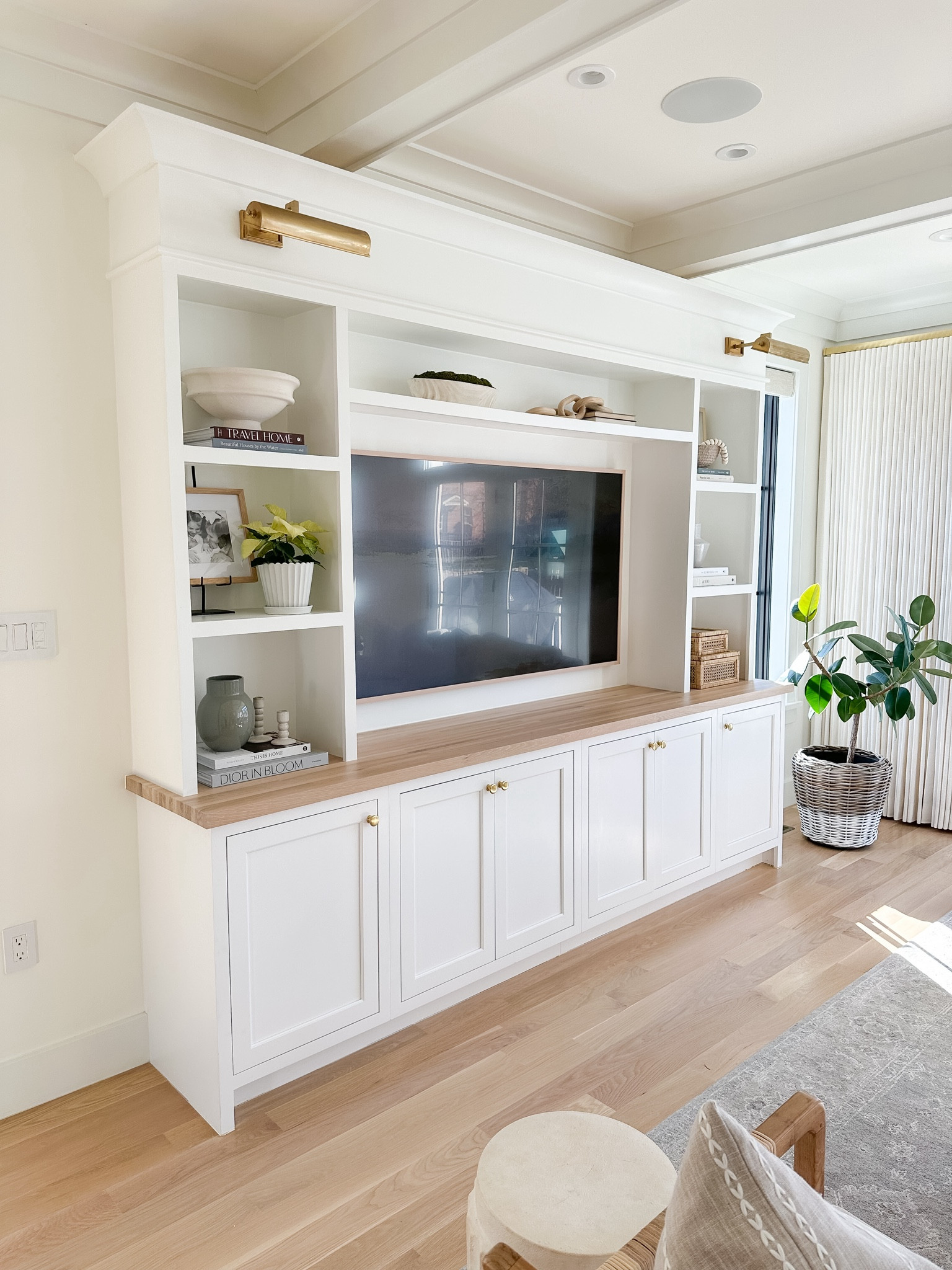 Our entertainment system was custom but I’m linked a similar one from pottery barn! I styled my shelves with new decor pieces from Amazon and the new Studio McGee  and hearth and hand lines at target! 

#LTKhome #LTKstyletip #LTKsalealert