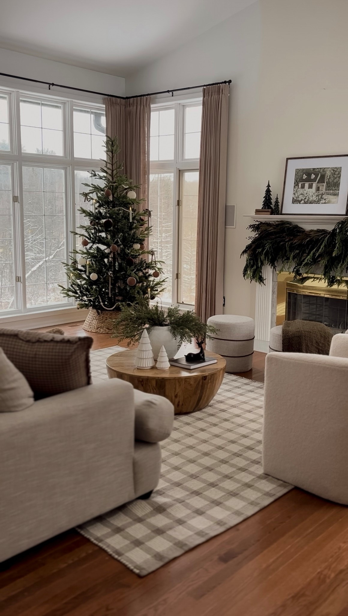 Christmas decor, living room Christmas decor, Christmas tree, Christmas tree decorations, Christmas tree ornaments, burgundy ribbon, LED candlesticks, garland, round coffee table, checkered rug, area rug, living room rug, Loloi rug, white accent chairs, neutral living room, white living room, living room curtains, tall ceiling curtains, floor to ceiling curtains

#LTKSaleAlert #LTKHome #LTKHoliday