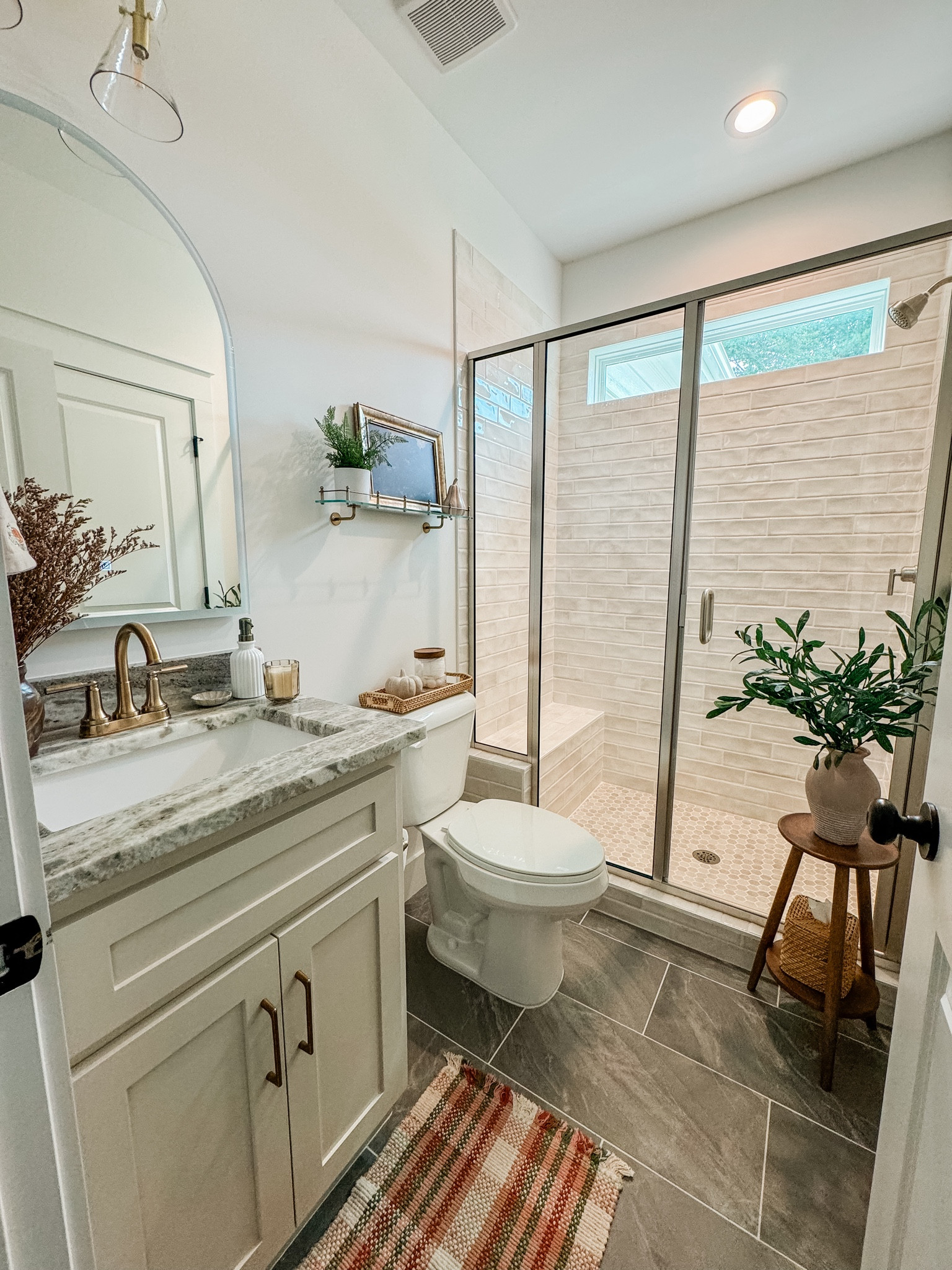 Subtle fall bathroom decor 

Fall bathroom, pumpkins, fall decor, fall styling, bathroom decor, cozy bathroom, fall decorating, subtle fall decor, ceramic pumpkins, McGee and co, dark vase, dried florals, bathroom design 