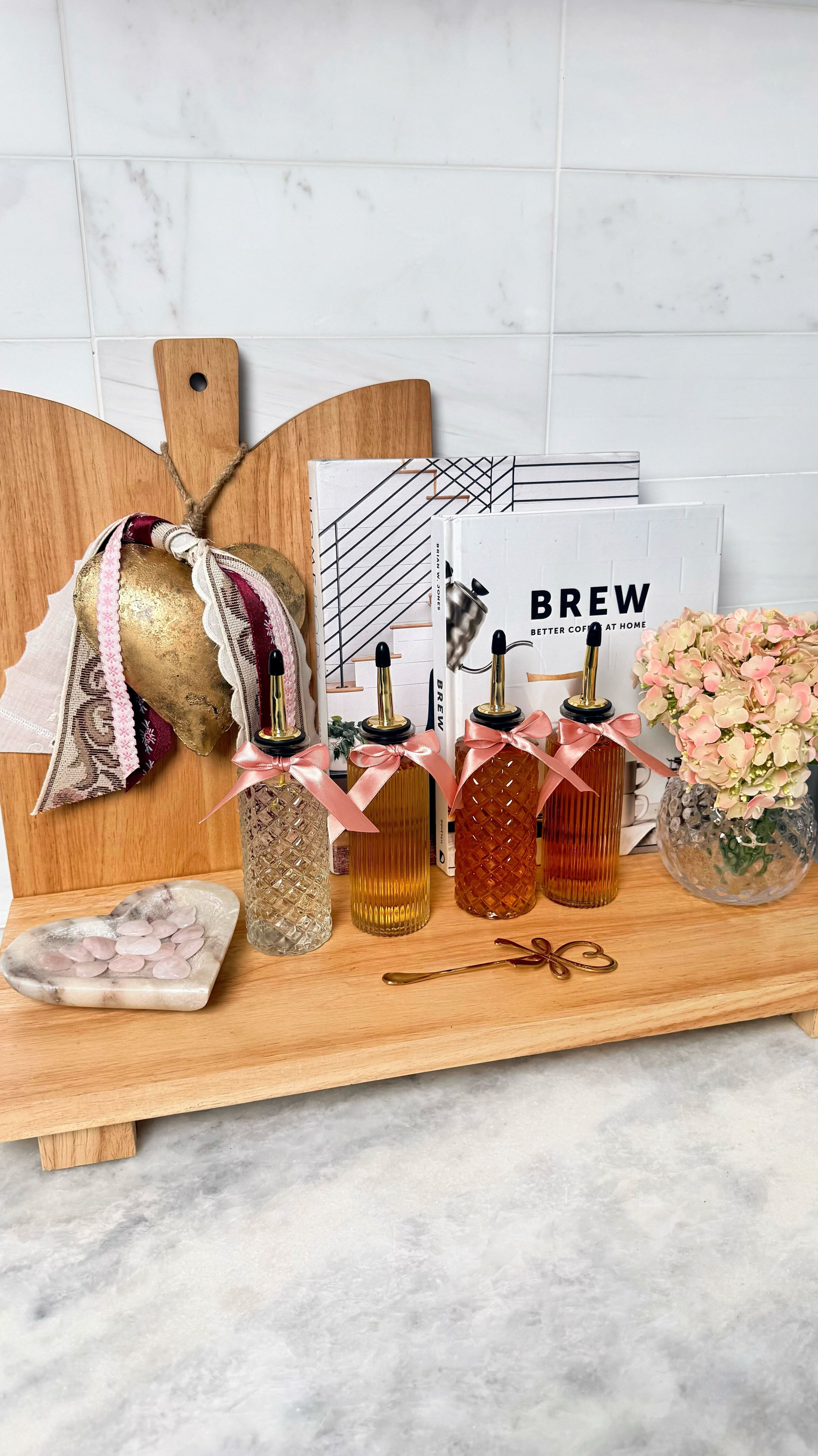 Valentine’s Coffee Bar Setup :coffee::cupid:
A little romance, a lot of cozy, and just enough pink to feel festive without overwhelming the space. Simple swaps, soft textures, and thoughtful details that make everyday moments feel special. This is your sign to create a coffee bar you actually look forward to using all month long. 

 #LTKValentine #LTKHome