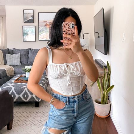 i'm wearing this top in a size medium and it fits true to size. the fabric is thin but i didn't find it see-through. it's a very cute summer top. 

#LTKFindsUnder50 #LTKStyleTip