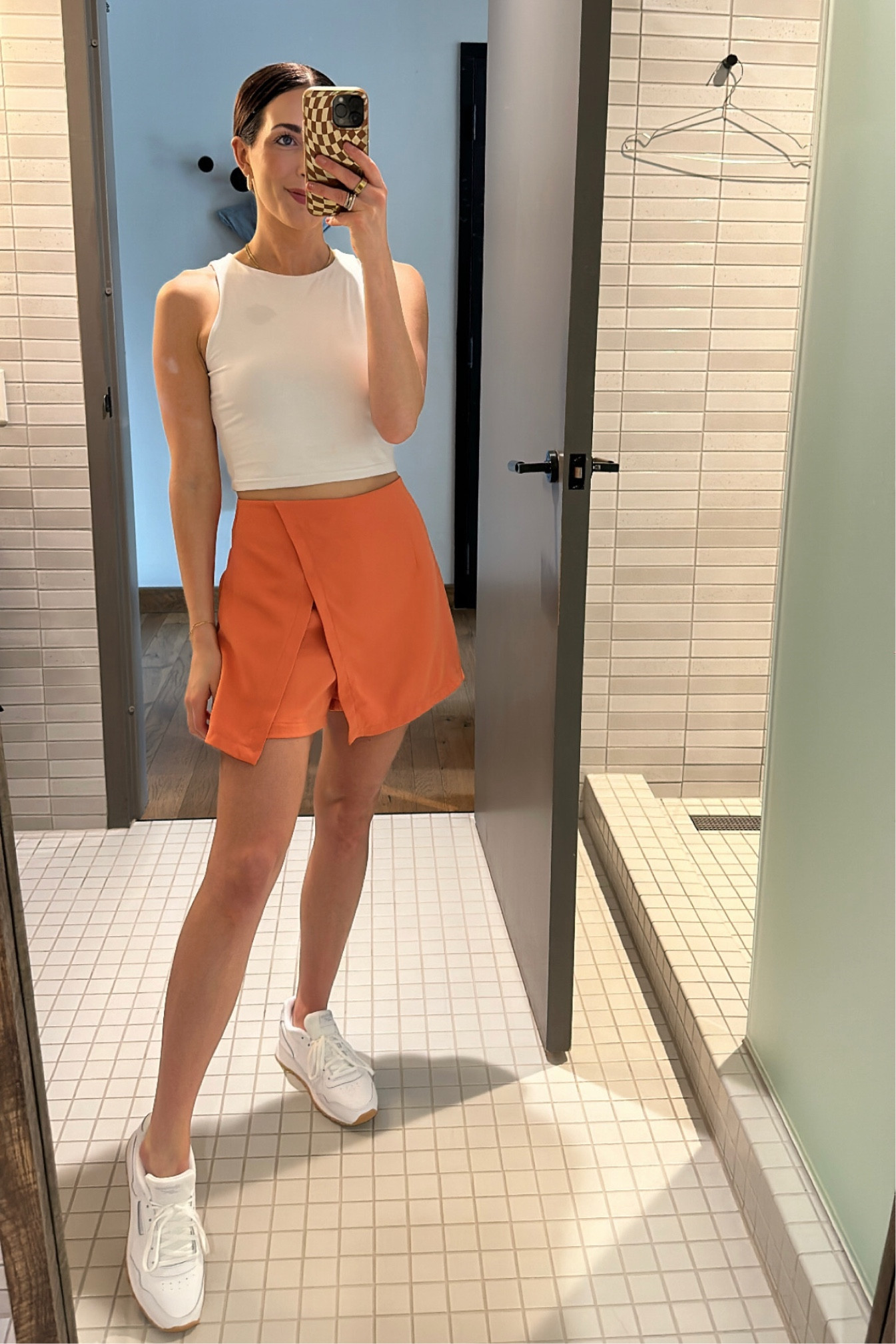 Amazon athleisure style: if you were looking for a cute summer sporty look, Amazon has all your must Travis including this sleeveless racer back tank, high waisted wrap skort, classic white sneakers, and gold accessories. Perfect casual summer style, summer workout style, sporty outfit. I’m 5’4.5 and I am wearing a small in the tank and the skort. Shoes fit TTS  

#LTKstyletip #LTKFitness #LTKFind