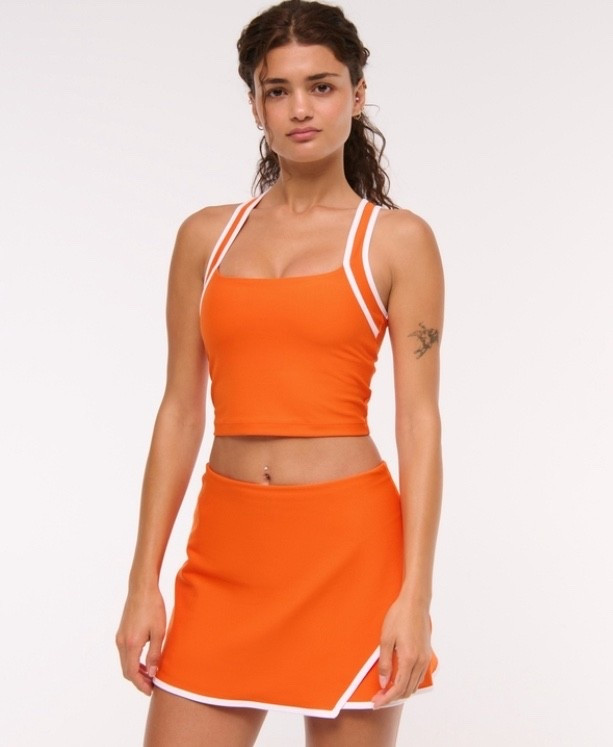 Orange exercise skirt and top 