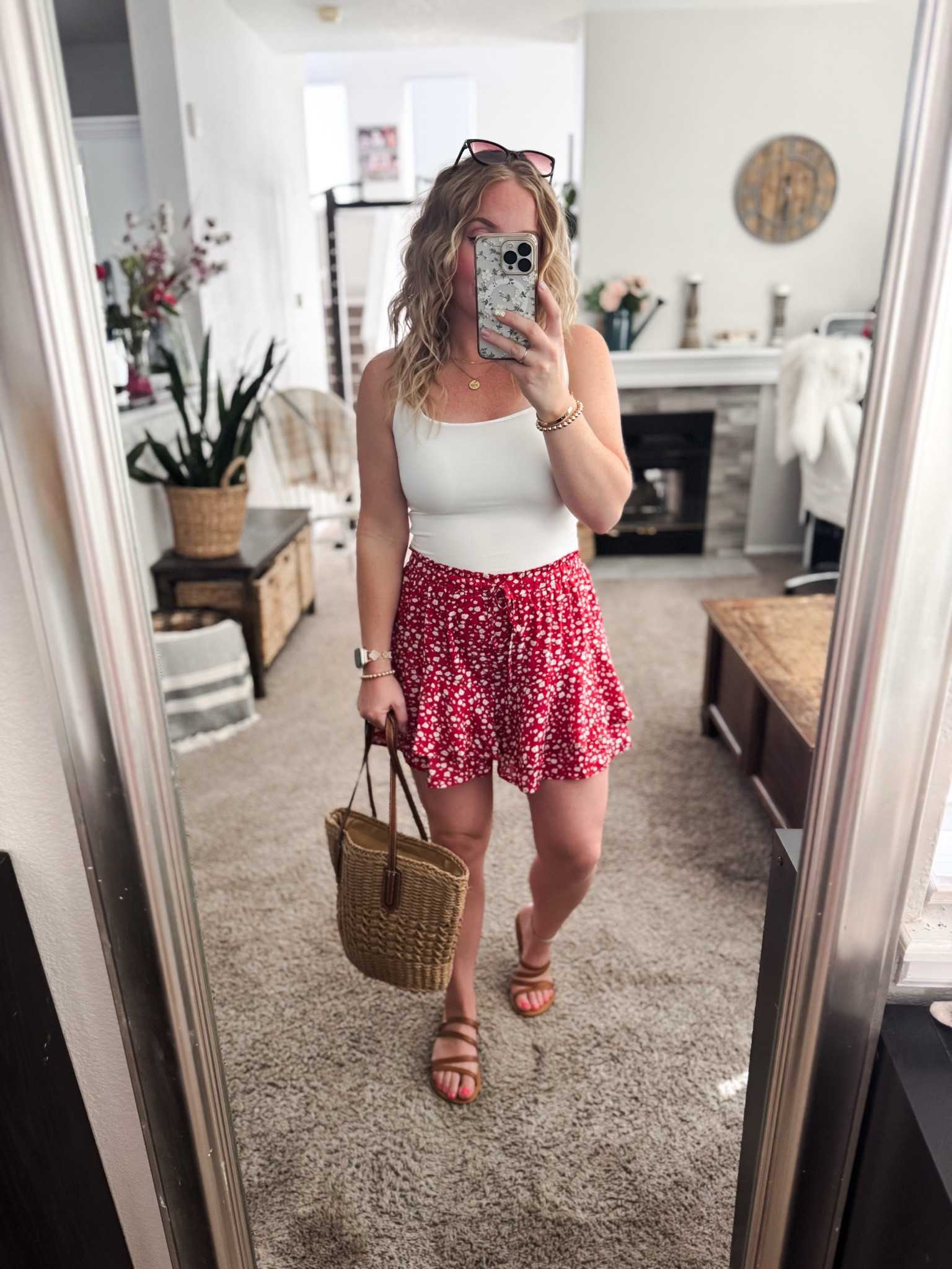 White double lined tank top with a red and white floral skort, straw handbag, and brown sandals. Everything fits tts






outfit inspo, outfit ideas, casual outfits amazon, amazon outfits every day, spring outfits 2026, summer outfits, summer skirt, boho skort 

#LTKootd #LTKSaleAlert #LTKPetite