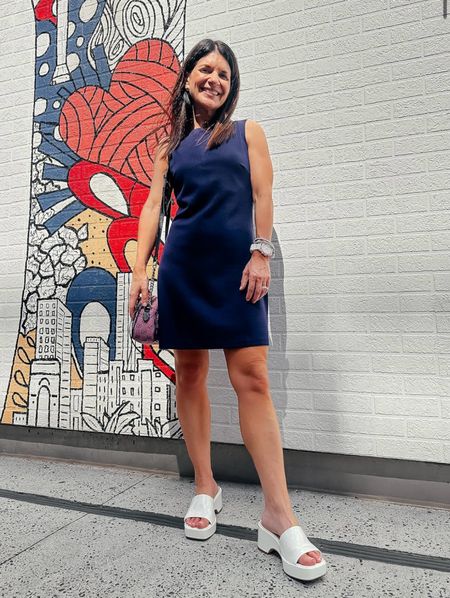 This amazon sleeveless navy blue mini dress is perfect for dressing up or down! I paired it with these slide on white wedges to keep it styled a little more dressy!


#LTKStyleTip #LTKFindsUnder100 #LTKSeasonal