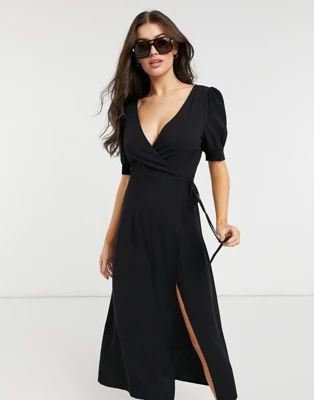 The Frolic Exclusive beach wrap dress in black | ASOS (Global)