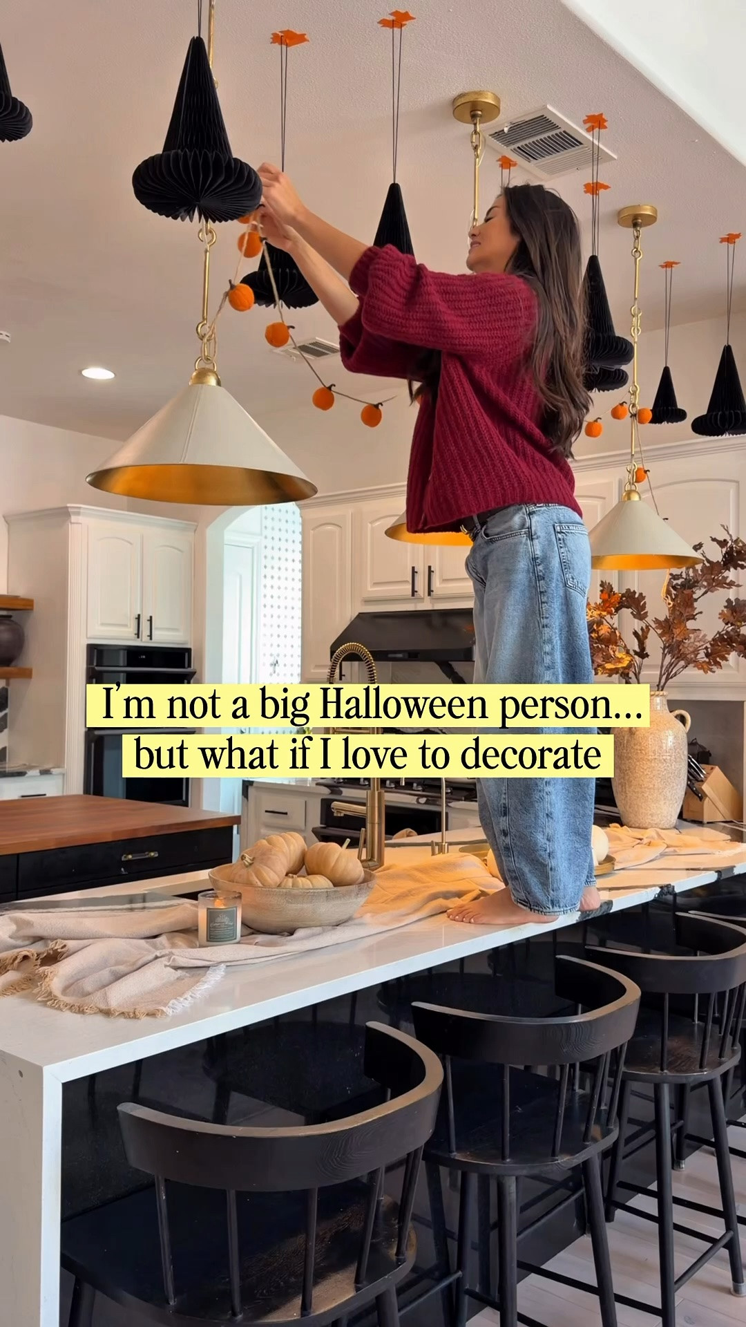 Decorating our kitchen with “Hints of halloween” from paper witch hats, pumpkin garlands, ghost candles, and acorn branches it’s a cozy whimsical October in our home - p.s. jeans are gap and sweater is Sezane! Both linked below

#LTKmomlife #LTKHome #LTKKids